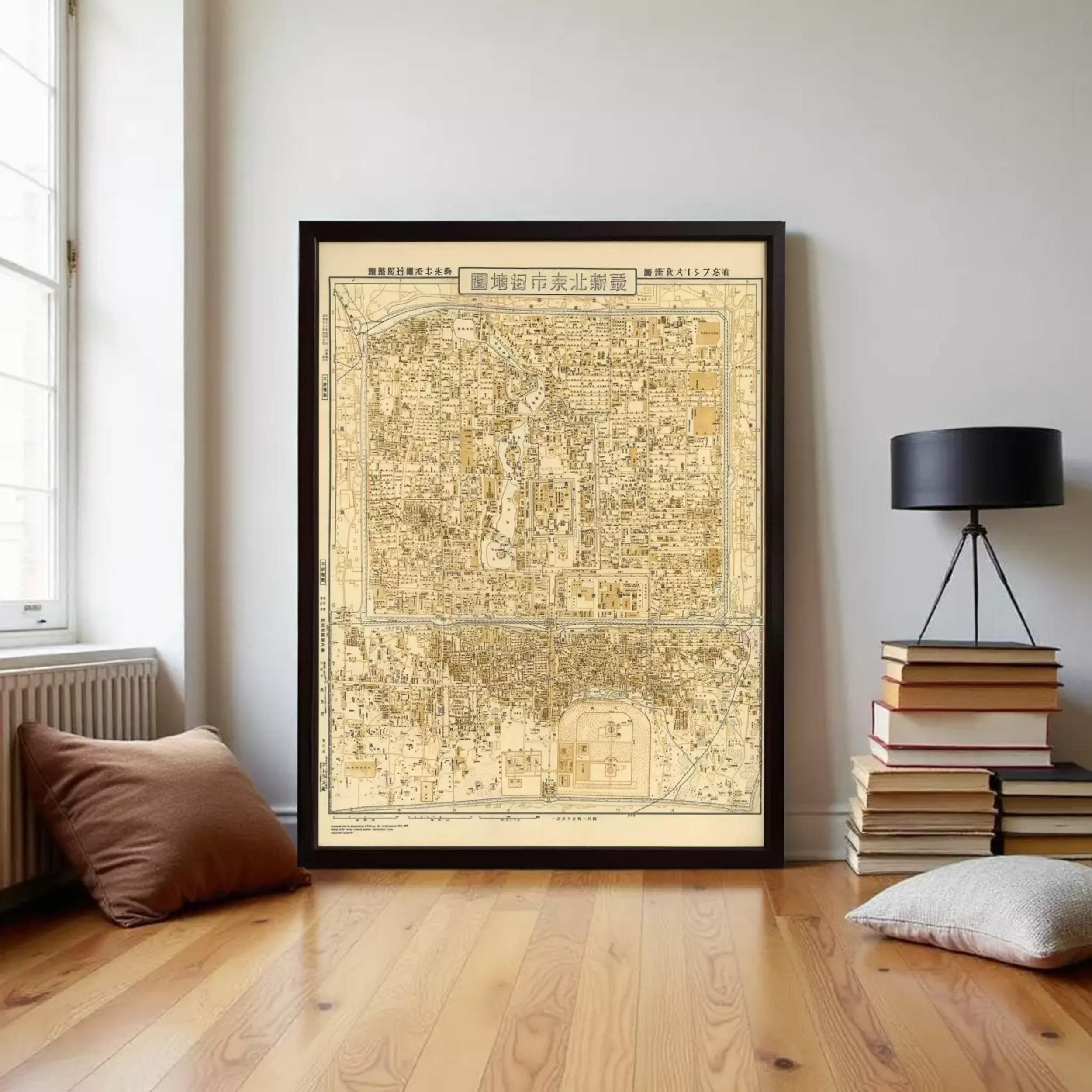The image is a framed map of a city, likely Tokyo, with detailed street and building maps.