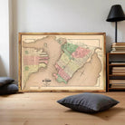 The image is a framed map of the city of São John, showing the layout of the streets, neighborhoods, and surrounding areas.