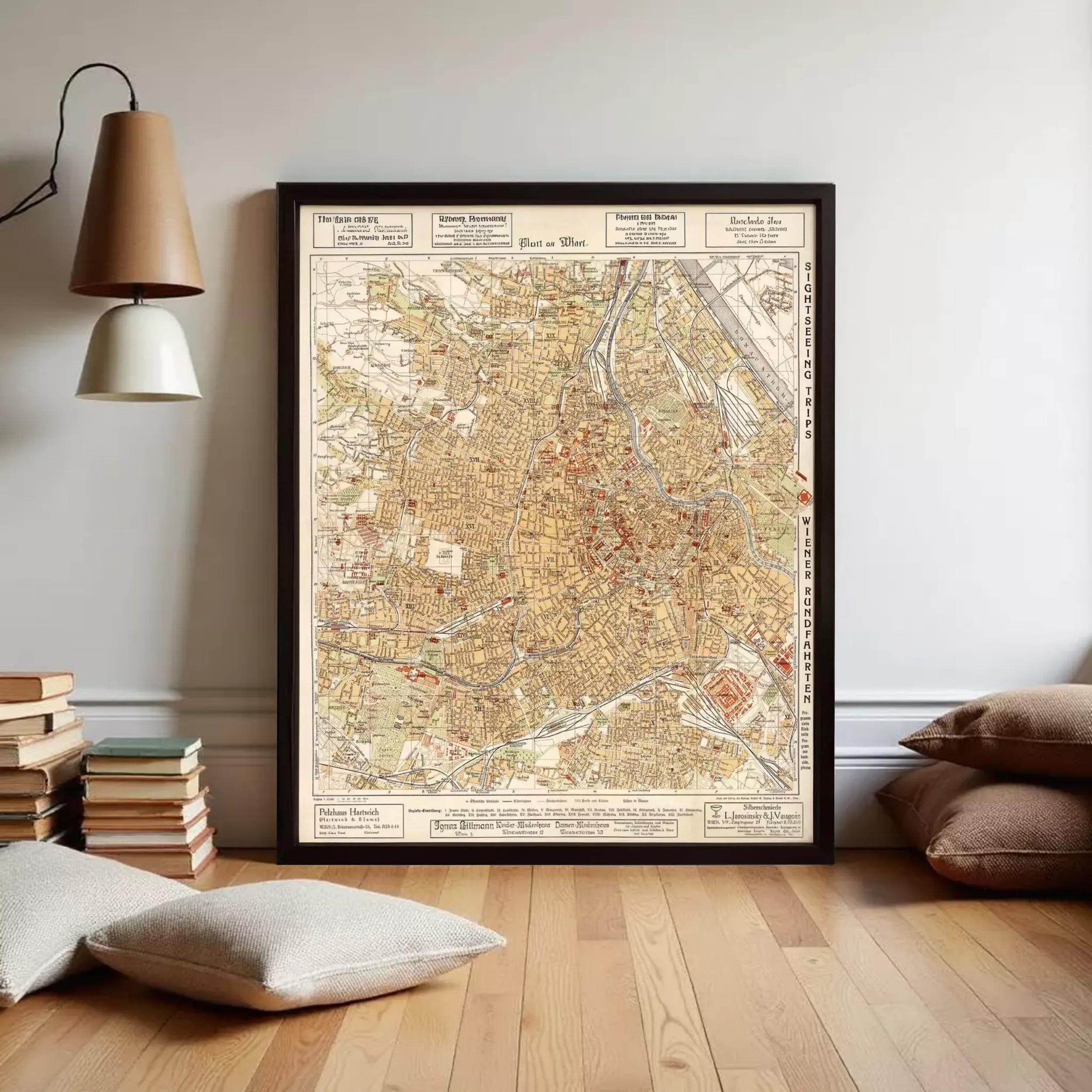The image is a framed vintage map of a city, likely Paris, with various landmarks and streets labeled.