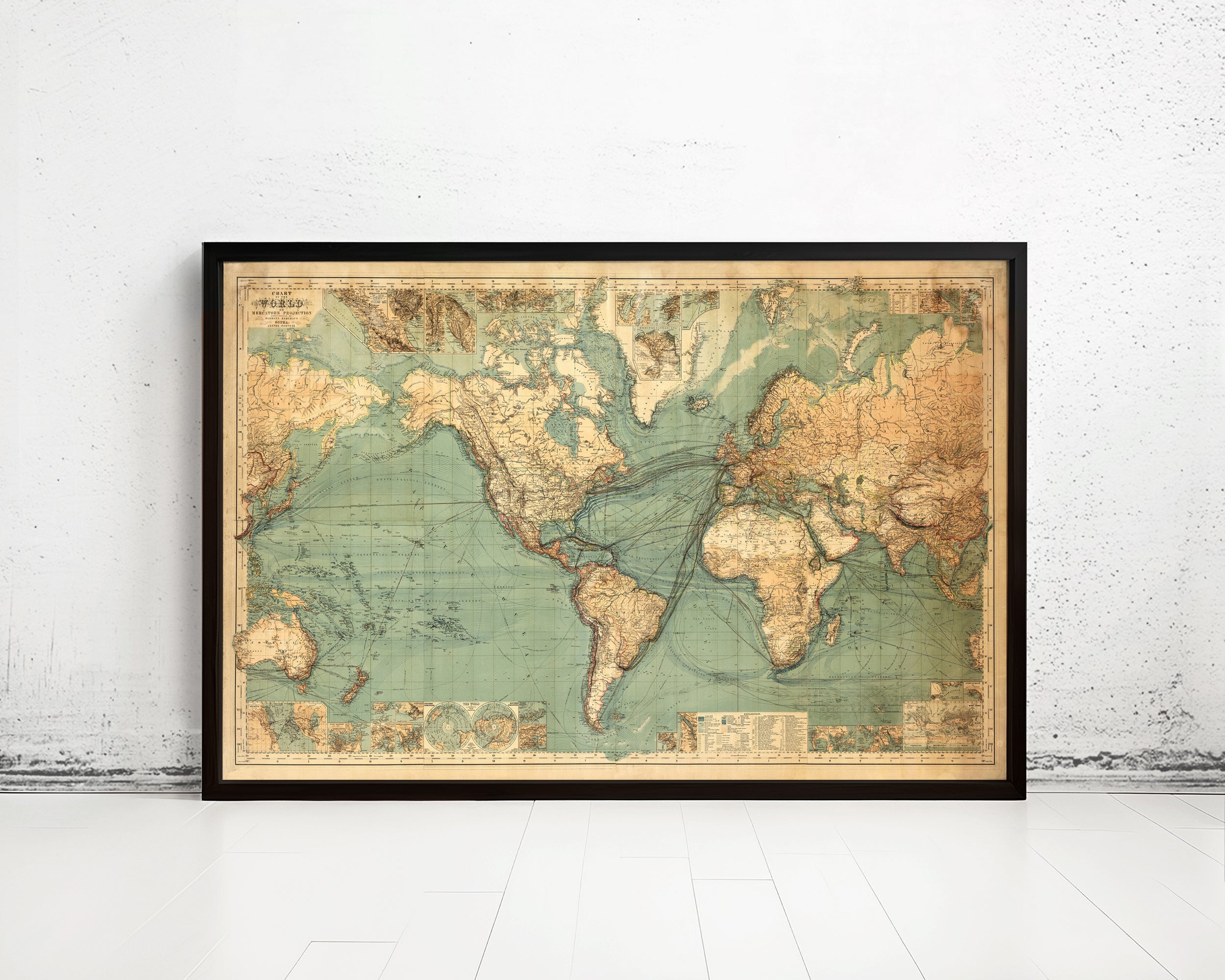 The image is a framed vintage map of the world, depicting the continents and oceans in a detailed and intricate manner.