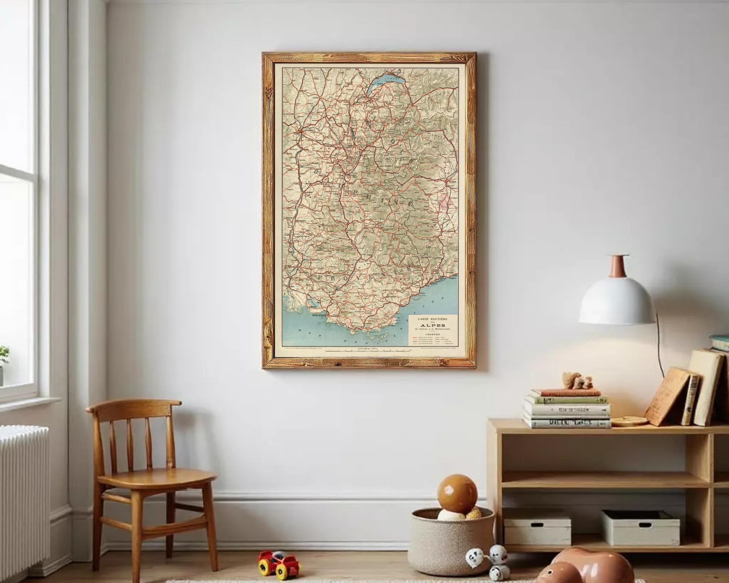 The image is a framed vintage map of the Alpes region, depicting the area in a detailed and intricate manner.