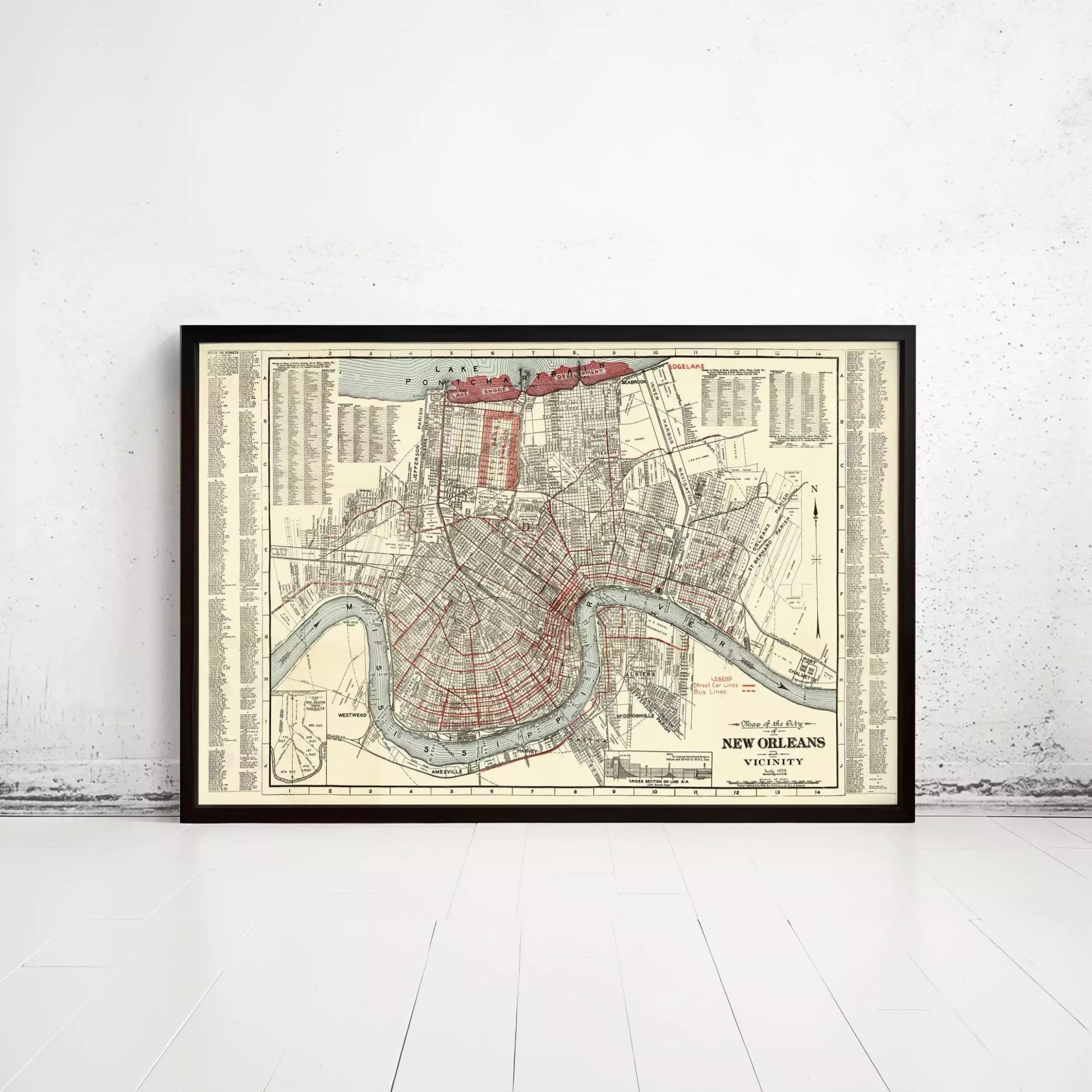 The image is a framed vintage map of New Orleans, Louisiana, depicting the city's layout and surrounding areas.