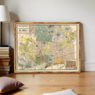 The image is a framed vintage map of Barcelona, Spain, depicting the city's streets and landmarks.