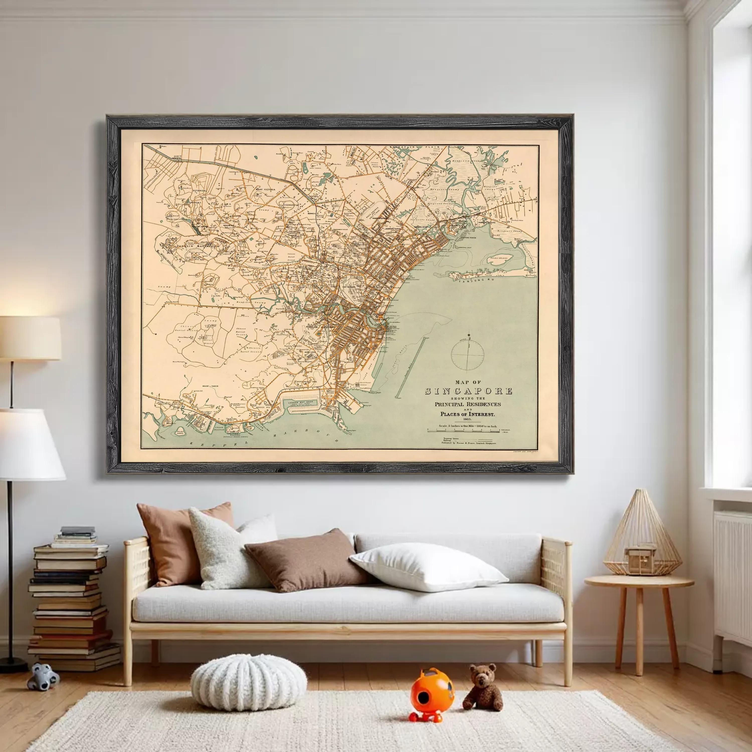 a large framed map of Singapore hanging on a wall in a living room.