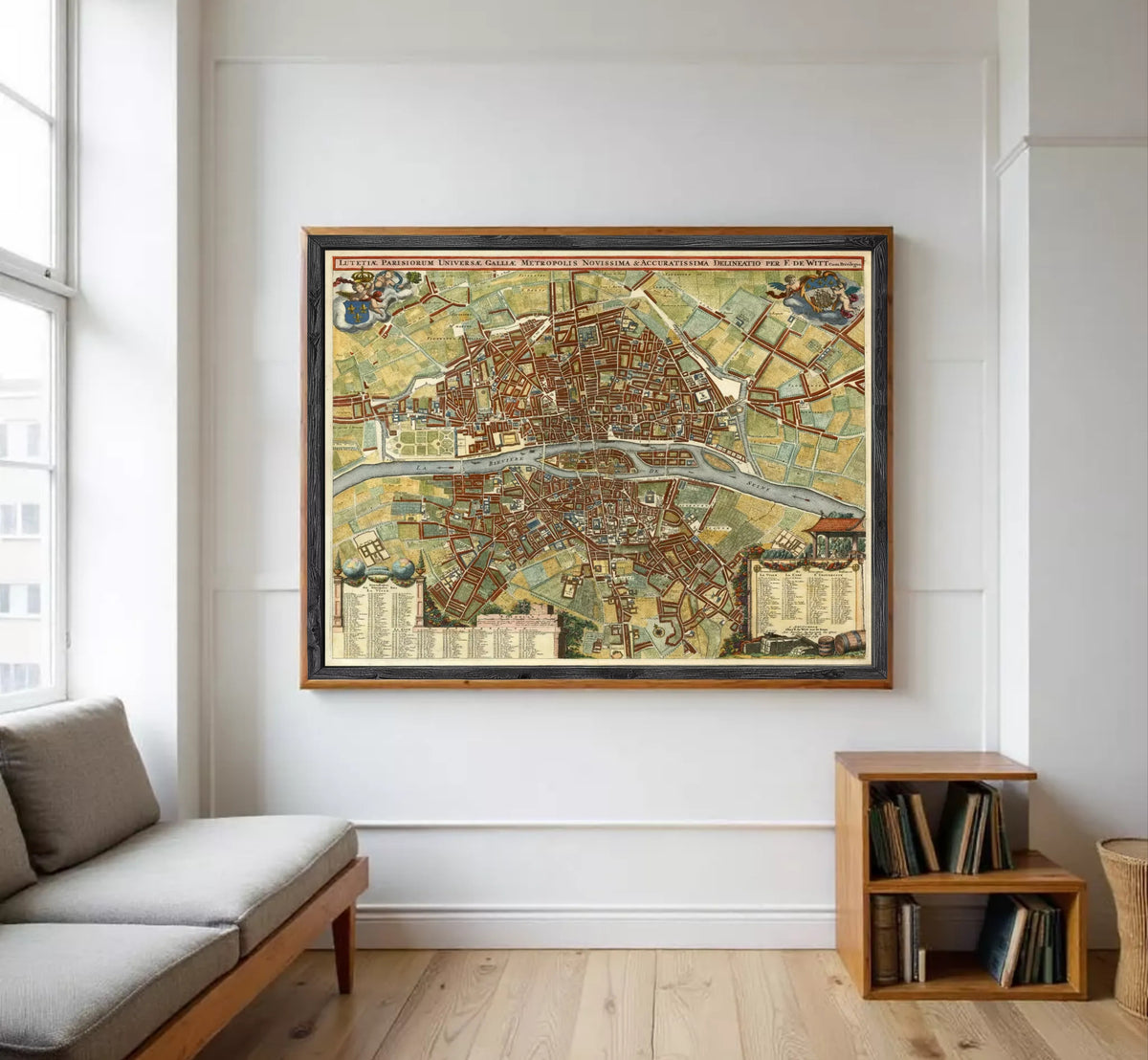 The image is a framed vintage map of a city, likely Paris, with detailed illustrations and labels.
