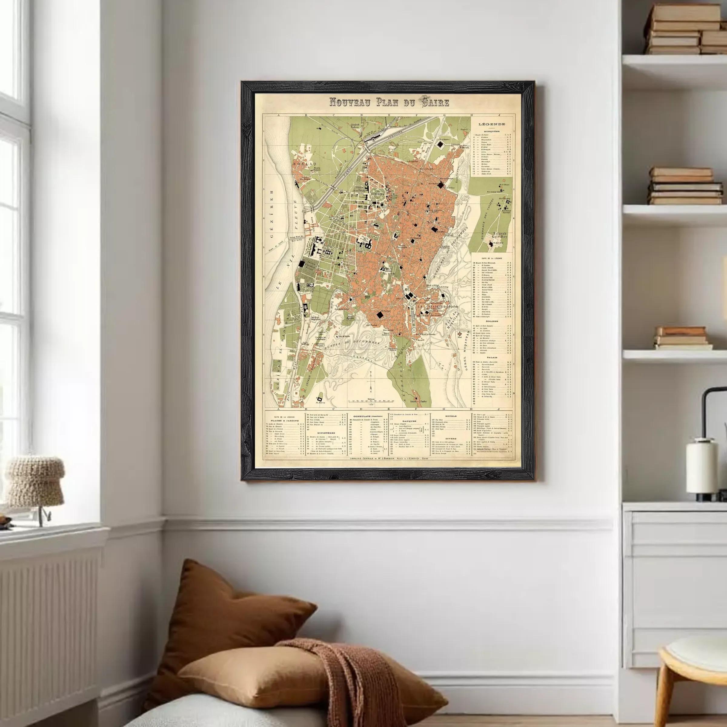 The image is a framed vintage map of a city, likely from the 19th century, with detailed geographical information and labels.