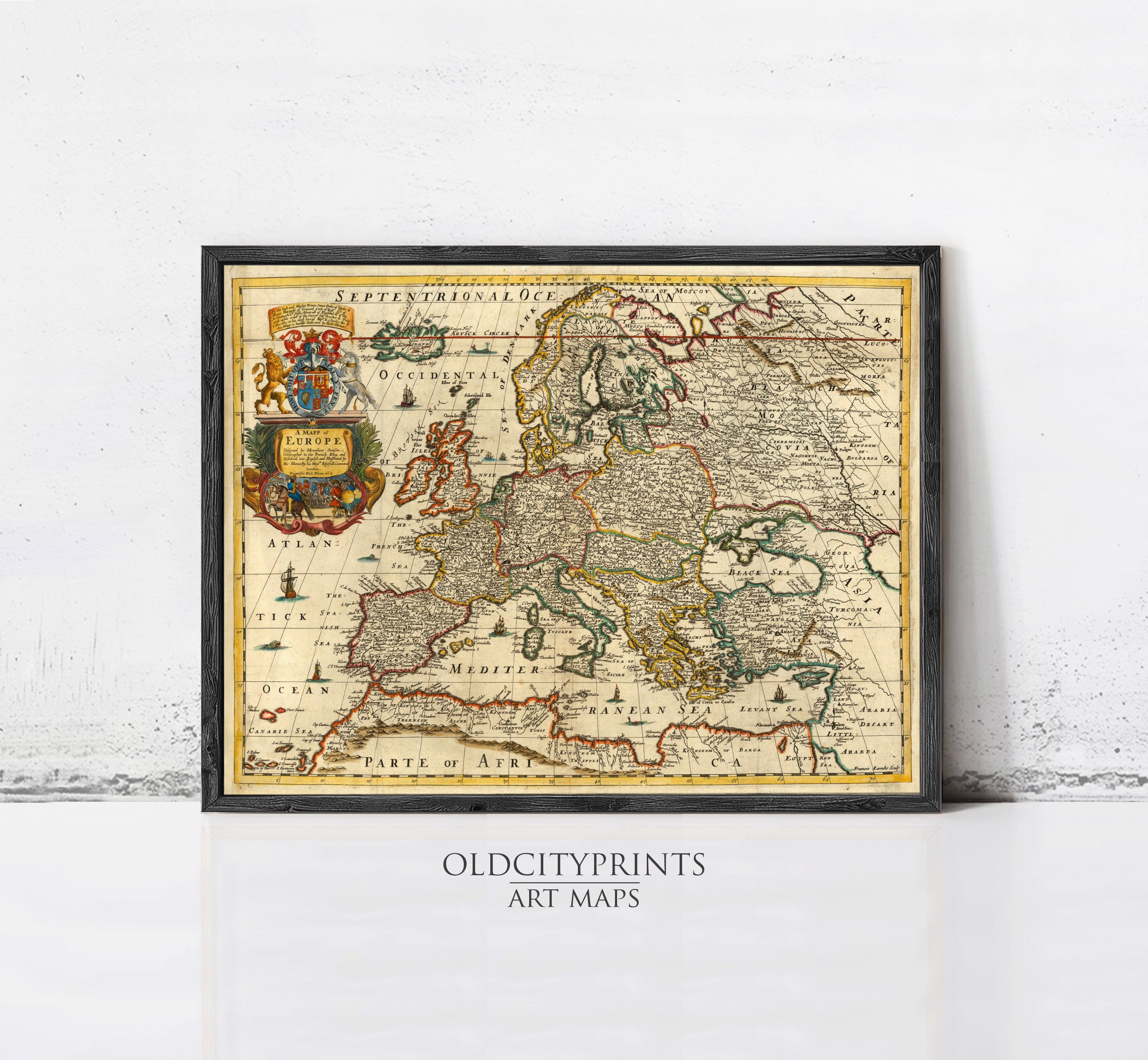 The image is a framed antique map of Europe and the surrounding regions, with a coat of arms on the left side.