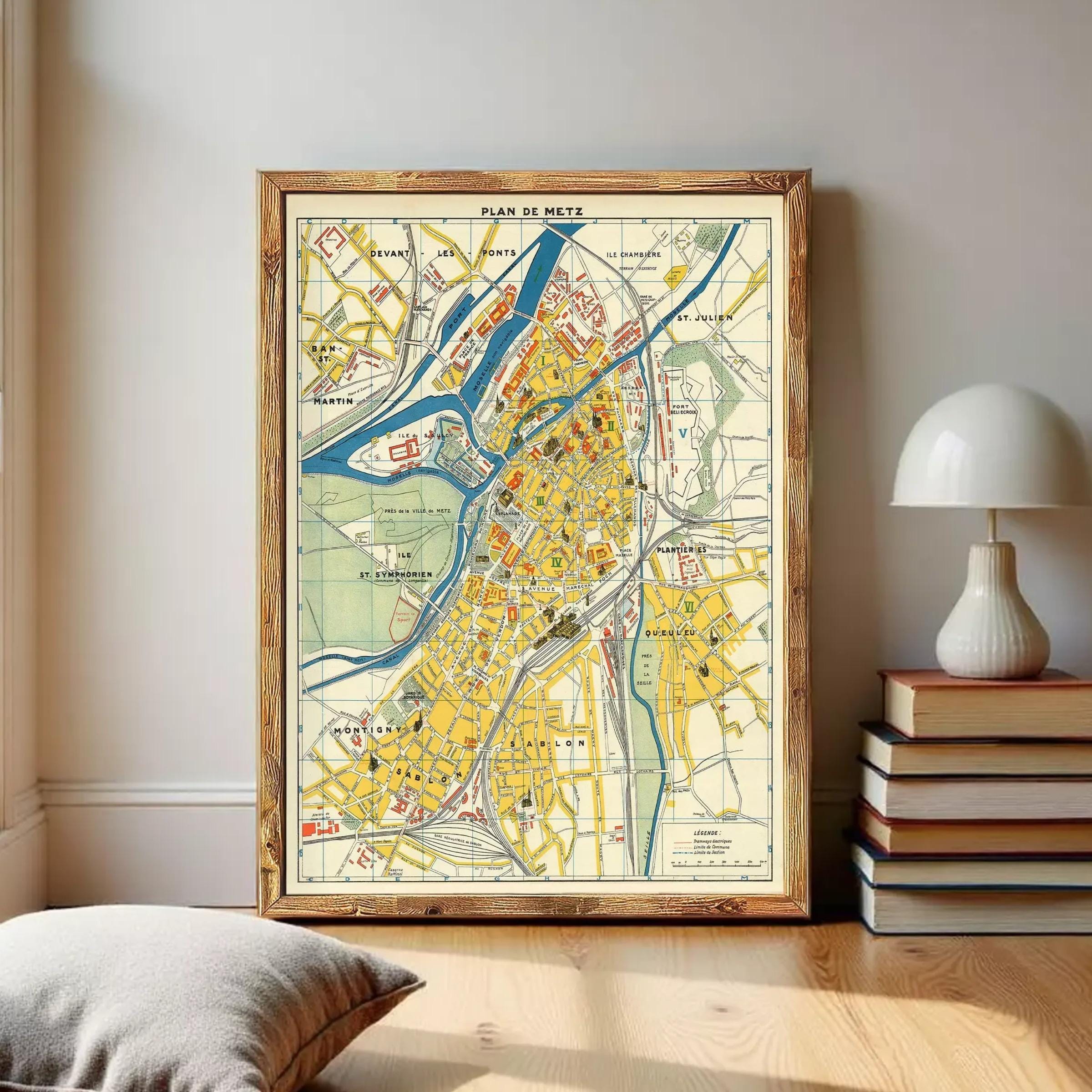 The image is a framed vintage map of a city, likely from the 19th century, with various streets, landmarks, and geographical features depicted.