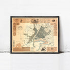 The image is a framed vintage map of a city, likely from the 19th century, with detailed street and geographical information.