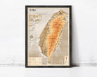The image is a framed map of Taiwan, depicting the country's geographical layout and surrounding areas.