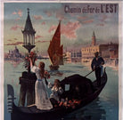 The image is a vintage poster depicting a gondola with two women on board, one of whom is holding a bouquet of flowers. The background shows a cityscape with a tall tower and a church steeple, along with other boats and buildings.