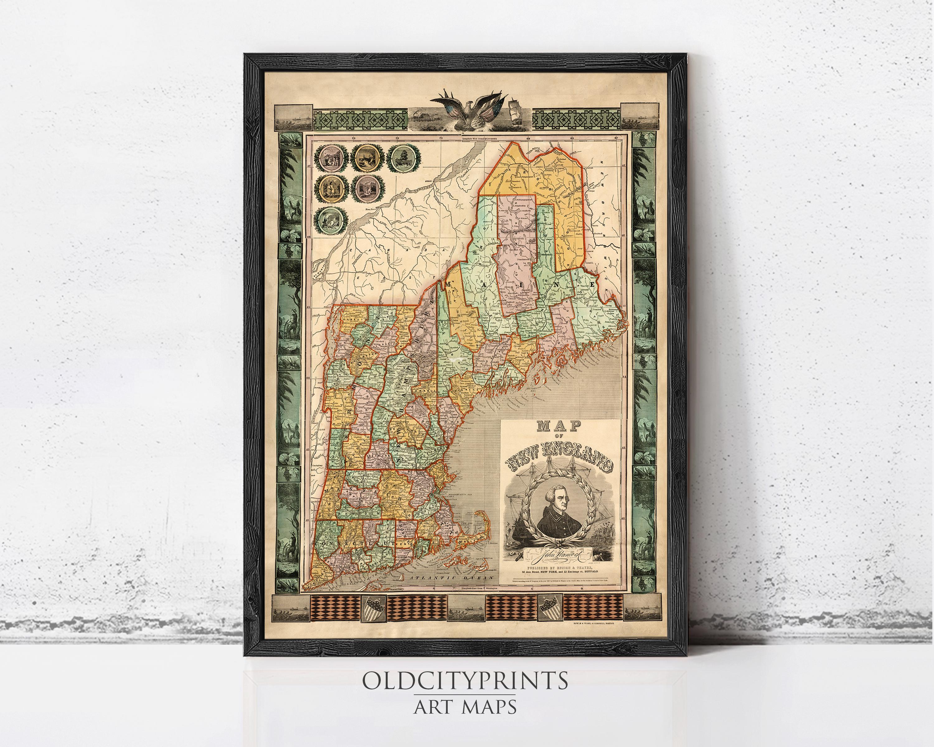 The image is a framed antique map of New England, depicting the region in a vintage style with intricate details and decorative elements.