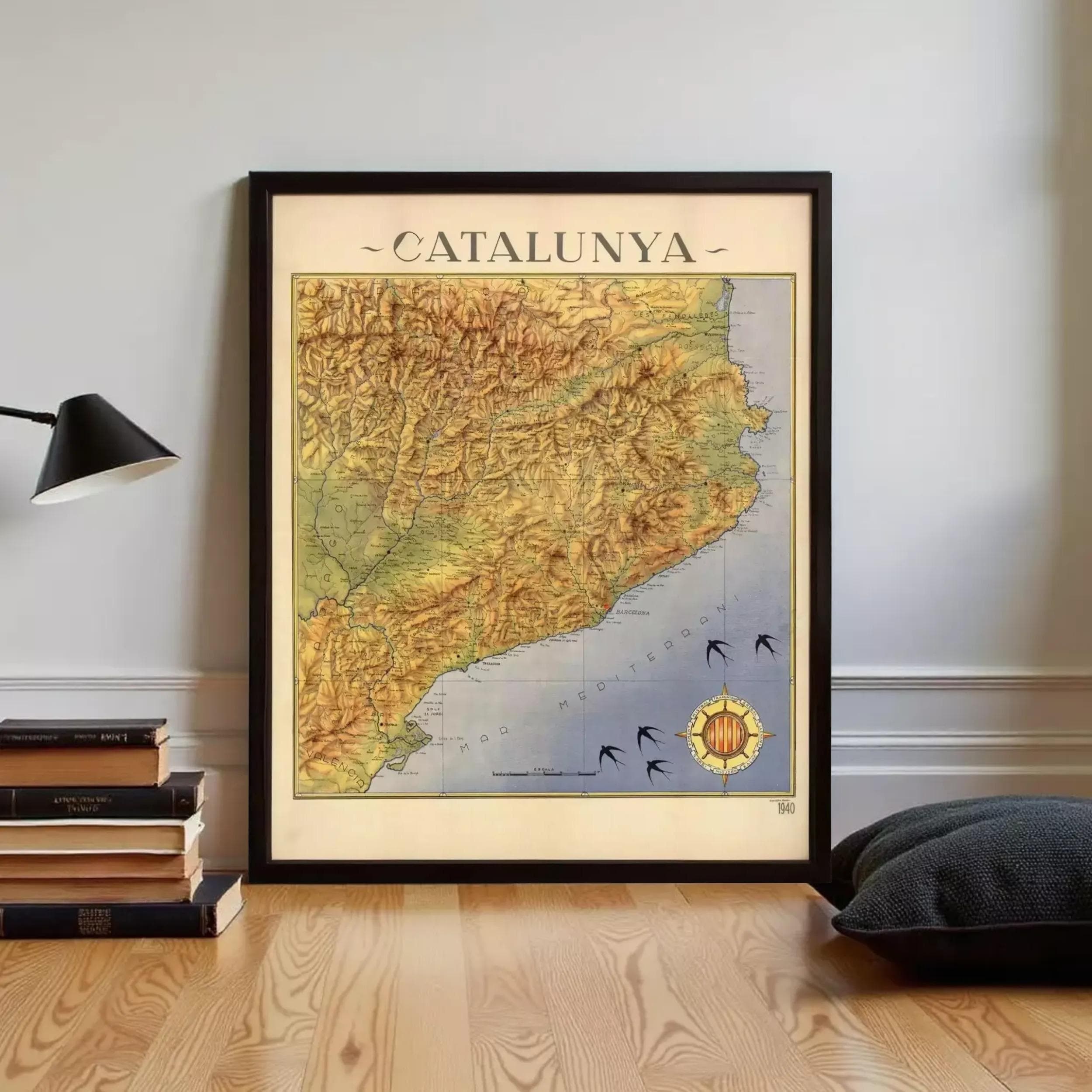 The image is a framed map of Catalunya, Spain, depicting the region's geographical features and boundaries.