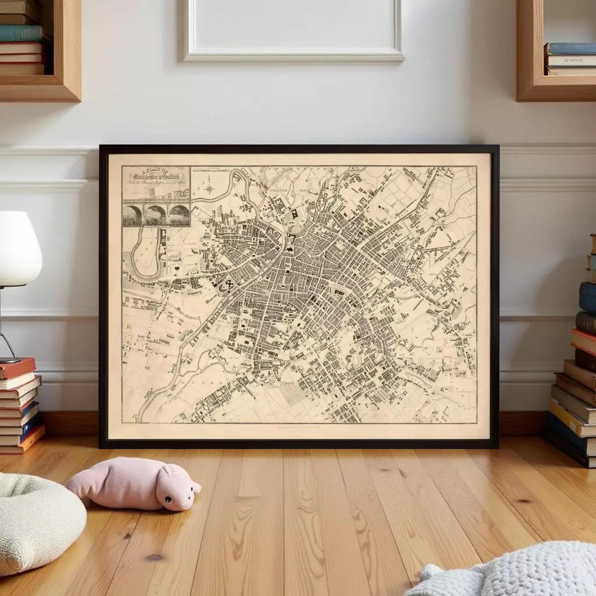 The image is a framed map of a city, likely a historical or geographical map, displayed on a white wall.