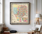 The image is a framed vintage map of Texas, depicting the state in a detailed and colorful manner.