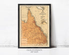 The image is a framed vintage map of the Queensland region in Australia, depicting the state's geographical layout and boundaries.