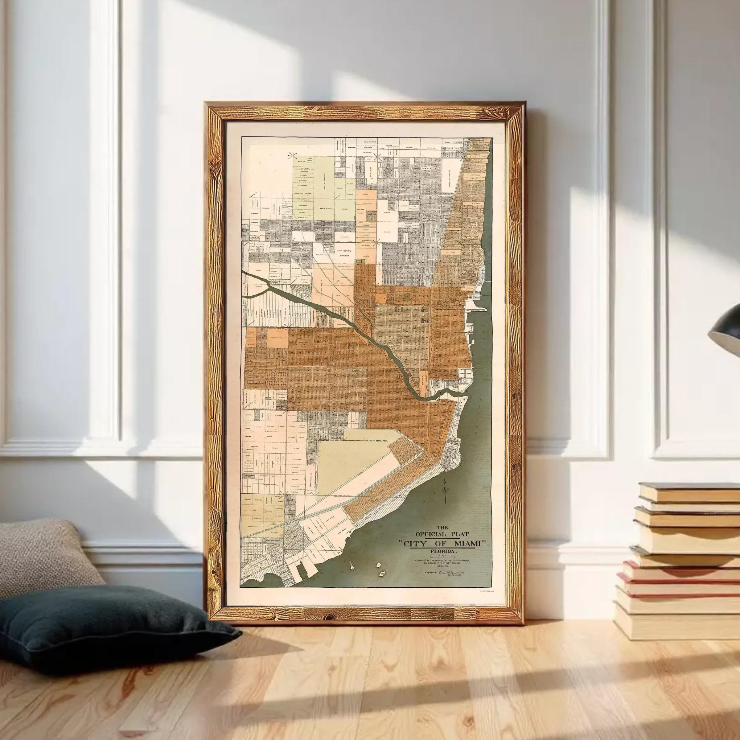 The image is a framed map of Miami, Florida, depicting the city's layout and surrounding areas.