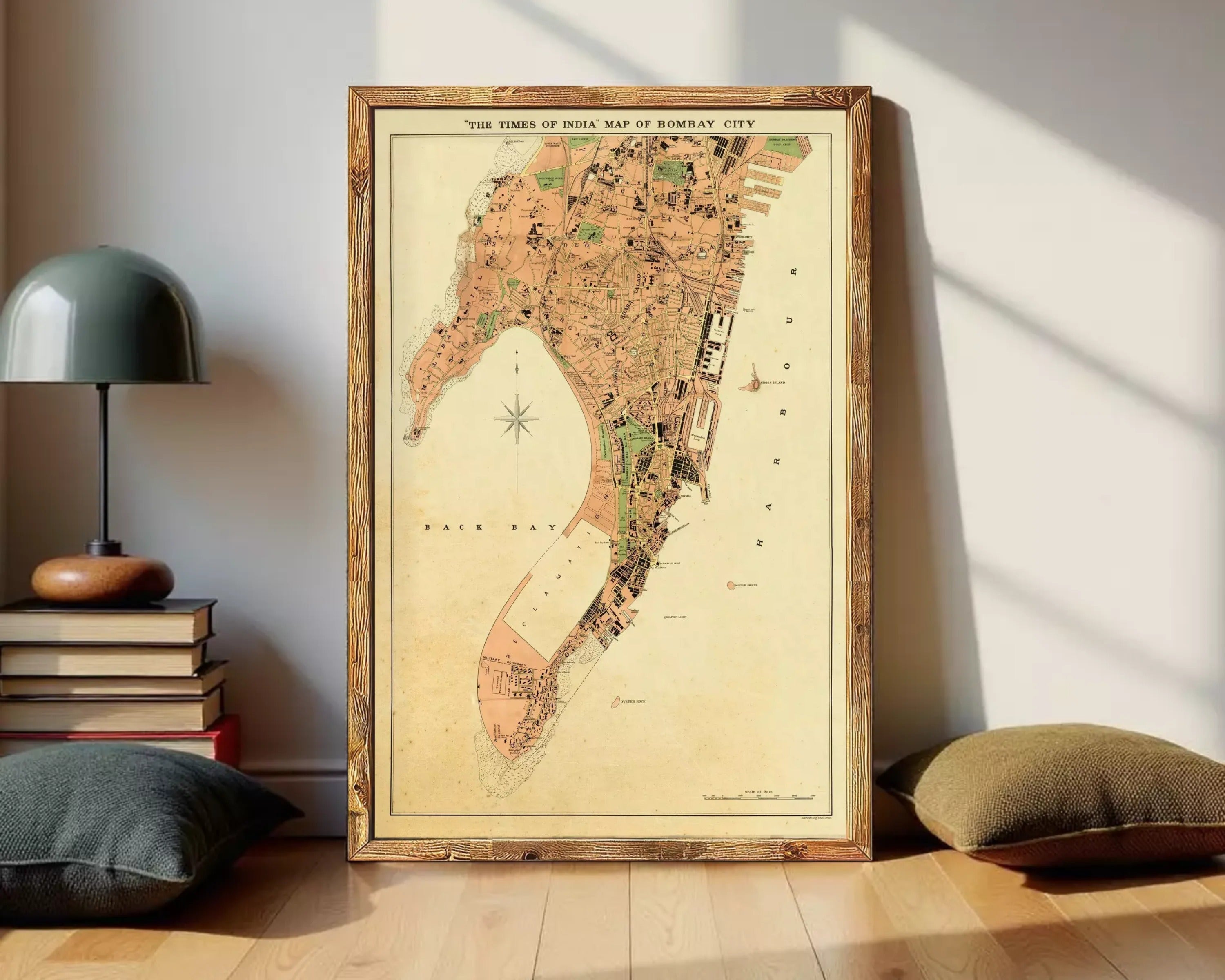 The image is a framed vintage map of the city of Bombay, India, depicting the city's layout and surrounding areas.