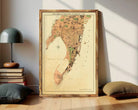 The image is a framed vintage map of the city of Bombay, India, depicting the city's layout and surrounding areas.