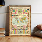 The image is a framed vintage map of the world, featuring various illustrations and text elements.