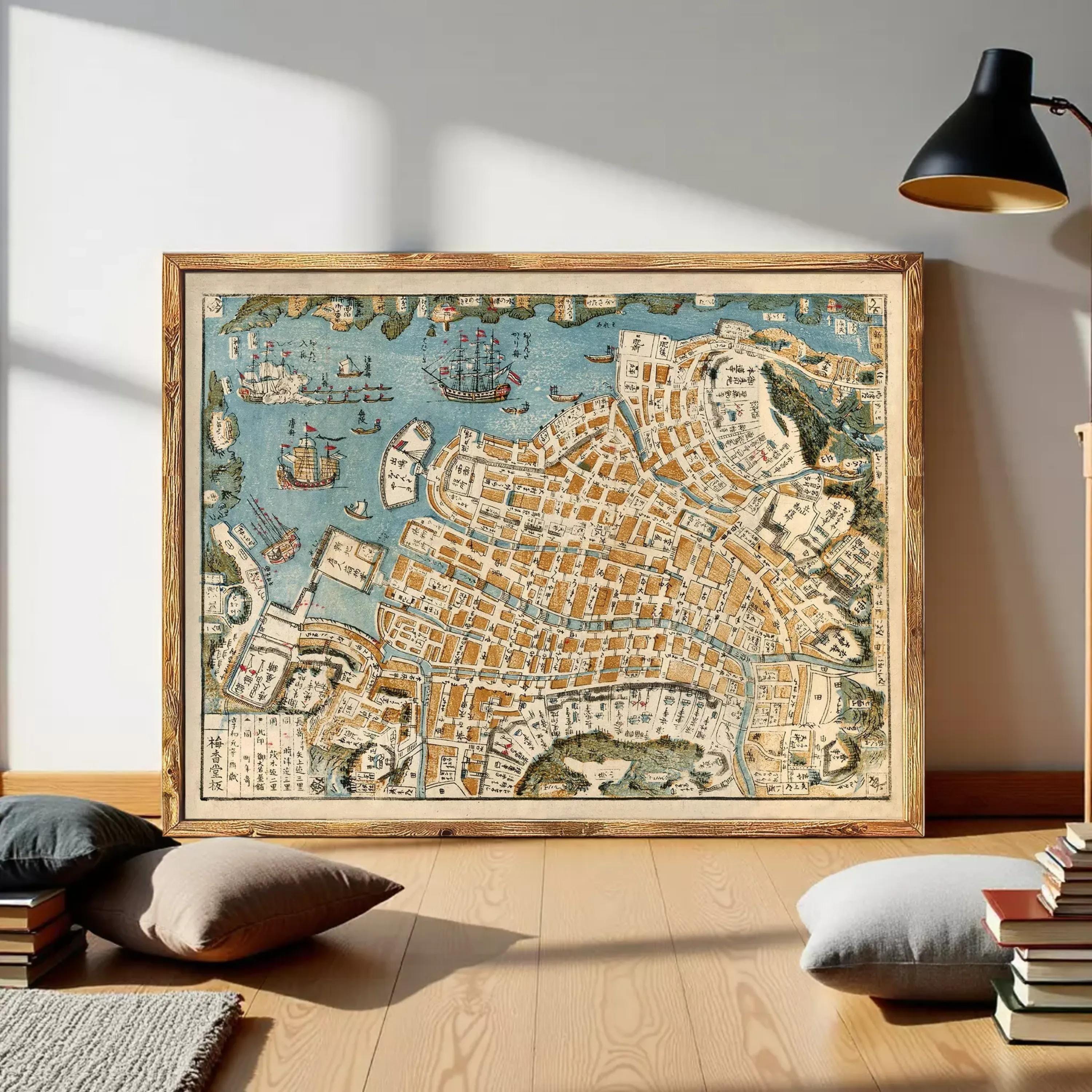 The image is a framed vintage map of a city, depicting various landmarks and streets.