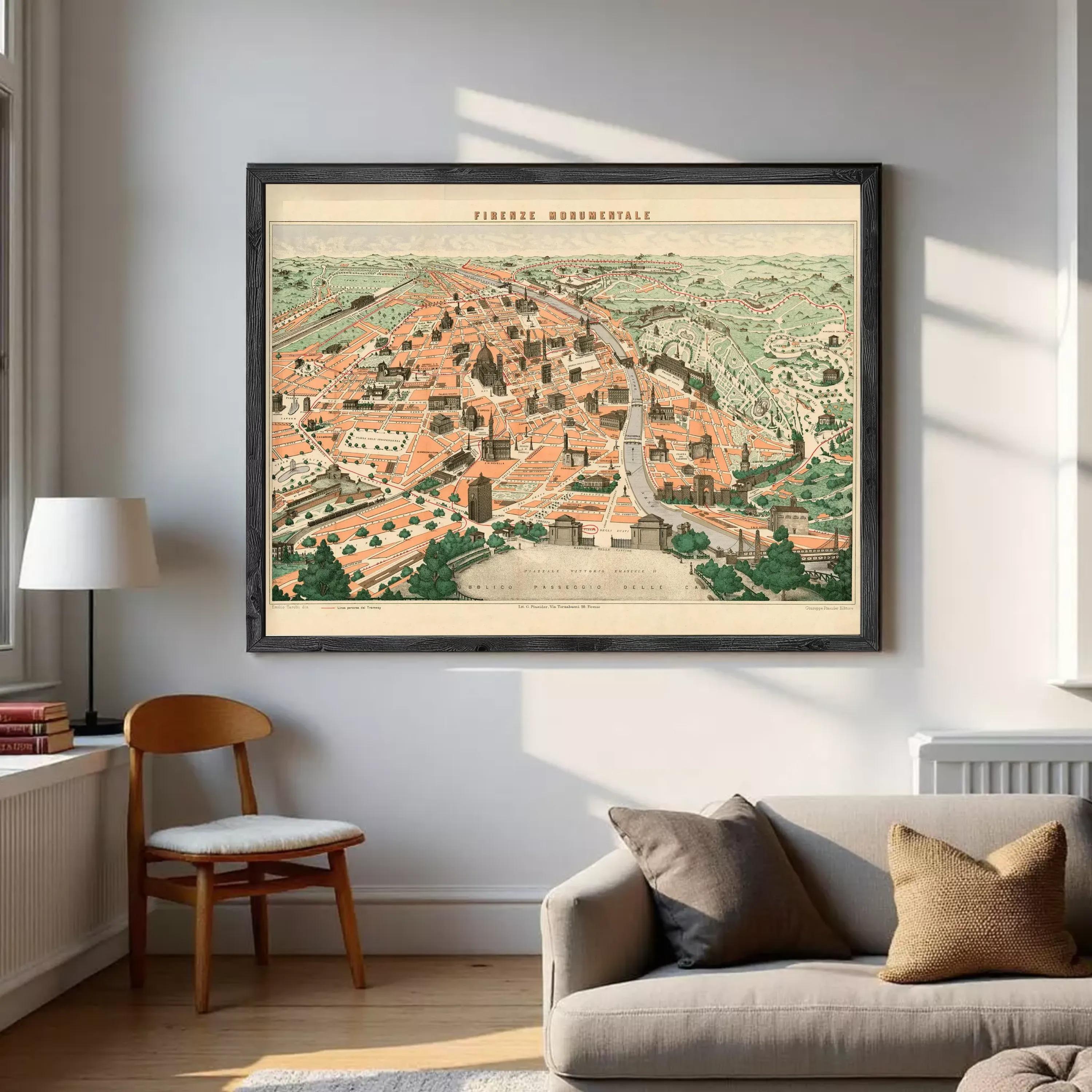 The image is a framed vintage map of a city, depicting a detailed and colorful cityscape with various buildings, roads, and natural elements.