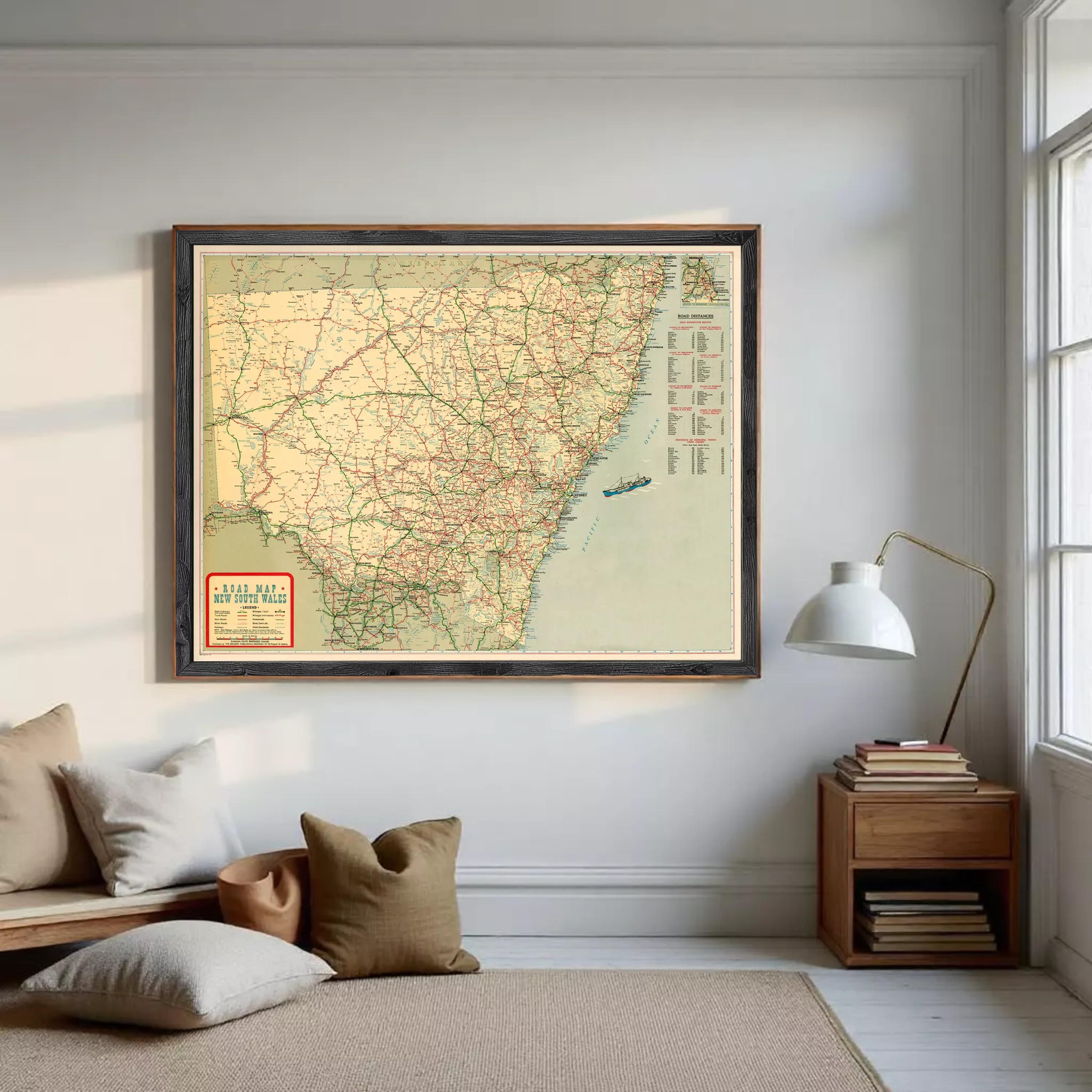 The image is a framed vintage road map of the United States, showing the major highways and cities in a detailed and colorful manner.