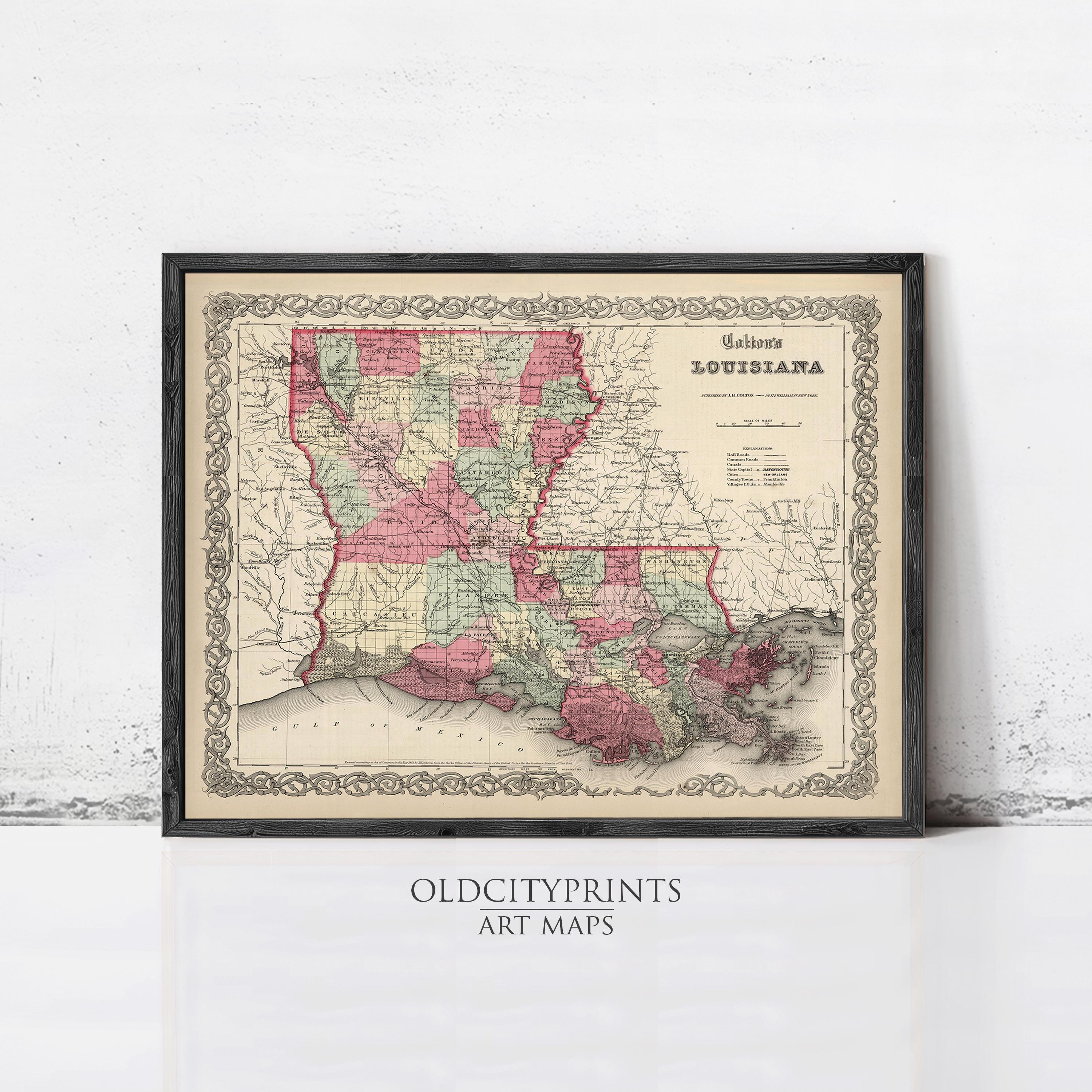 The image is a framed vintage map of Louisiana, depicting the state in a detailed and colorful manner.