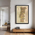 a large framed map of Portugal hanging on a wall in a room.