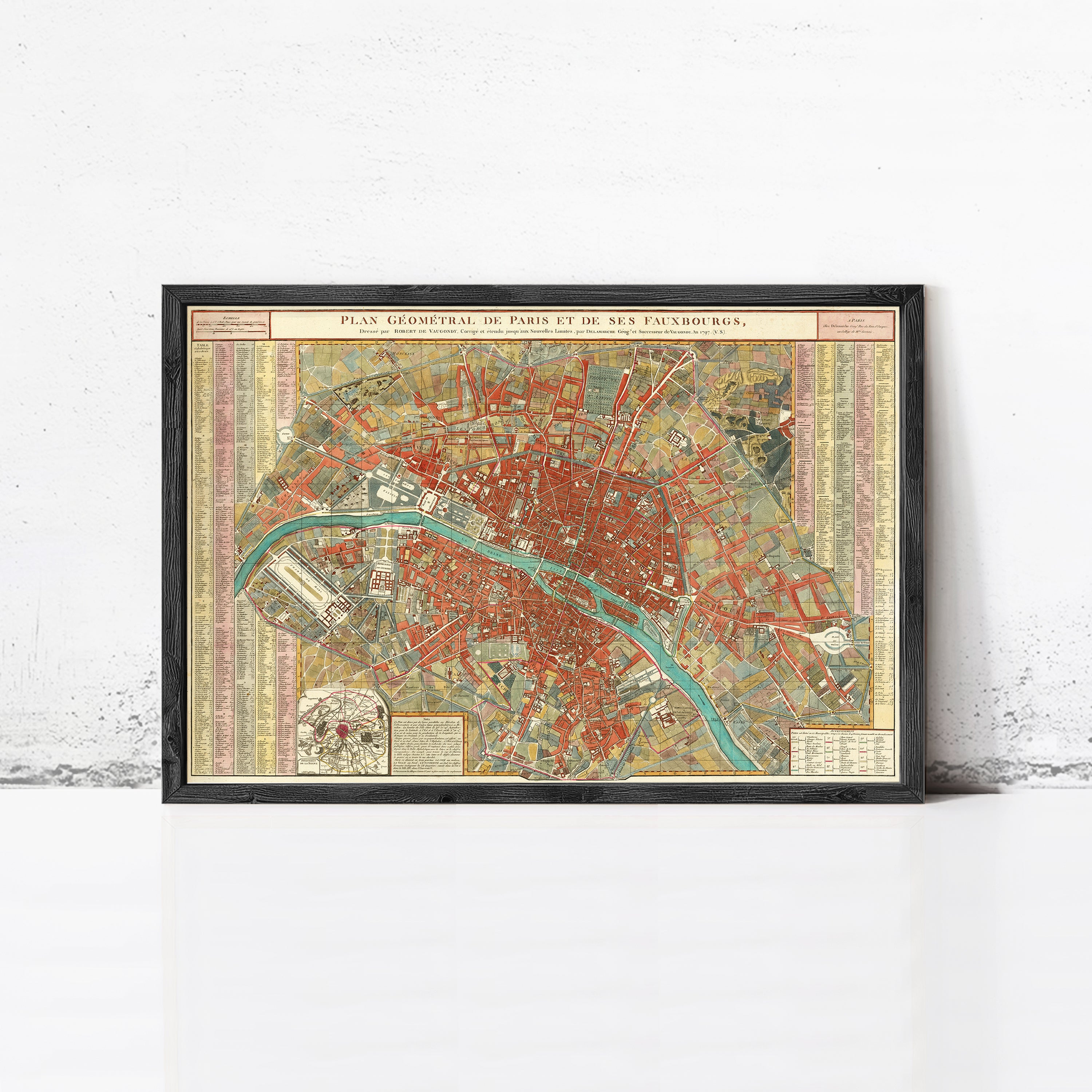 The image is a framed vintage map of Paris, France, depicting the city's streets and landmarks.