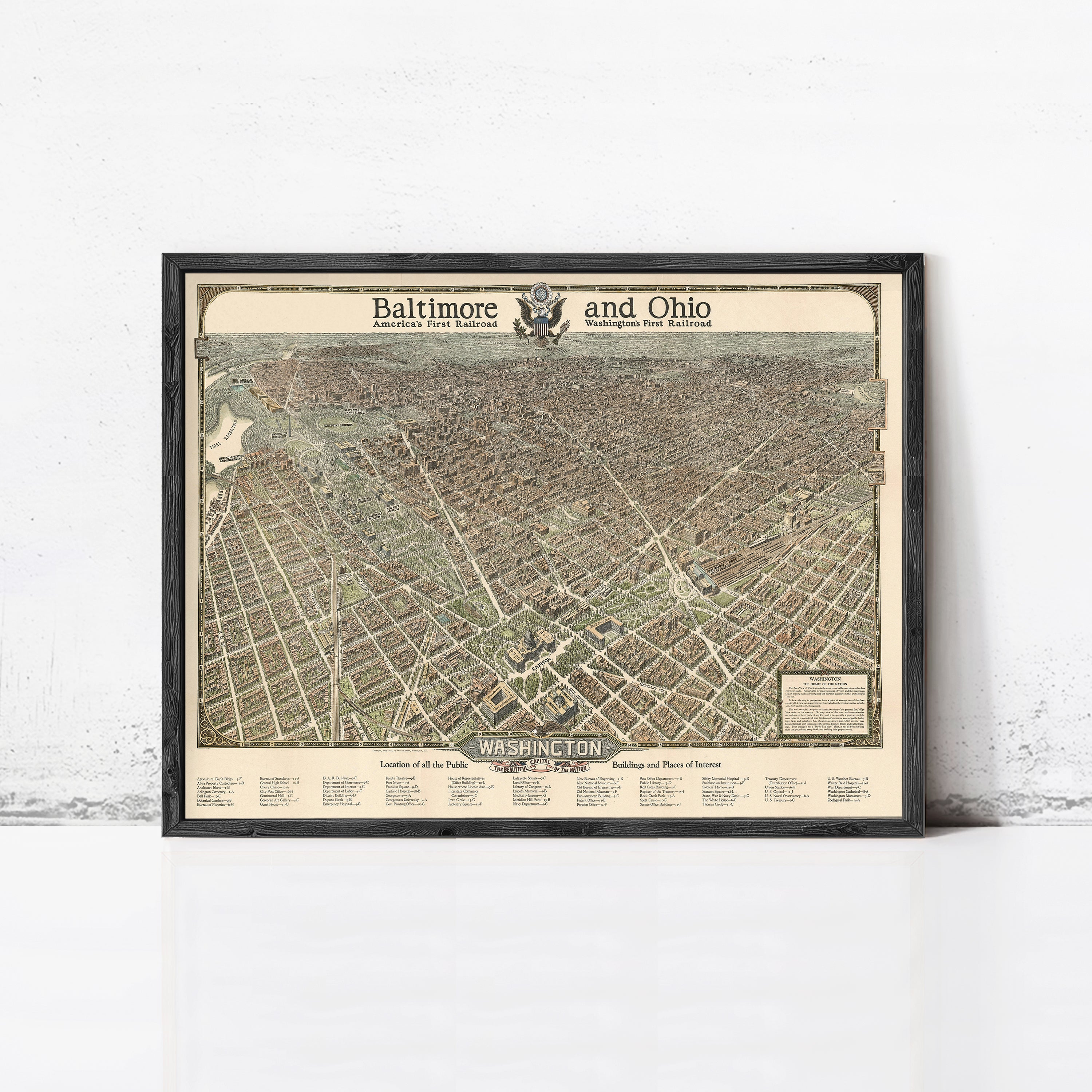 The image is a framed map of Baltimore and Ohio, depicting the city's streets and surrounding areas.