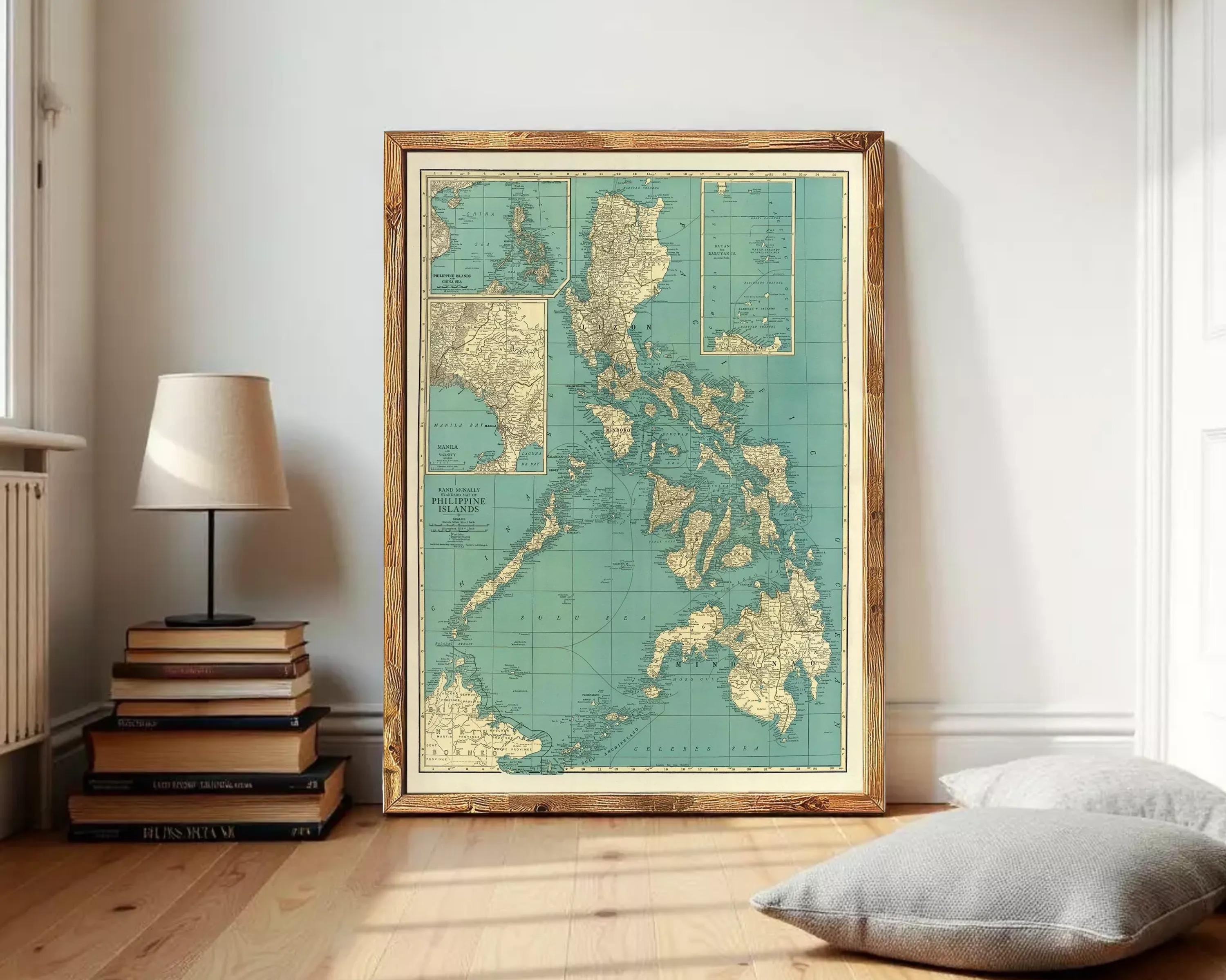The image is a framed vintage map of the Philippines, showing the country's geographical layout and surrounding areas.