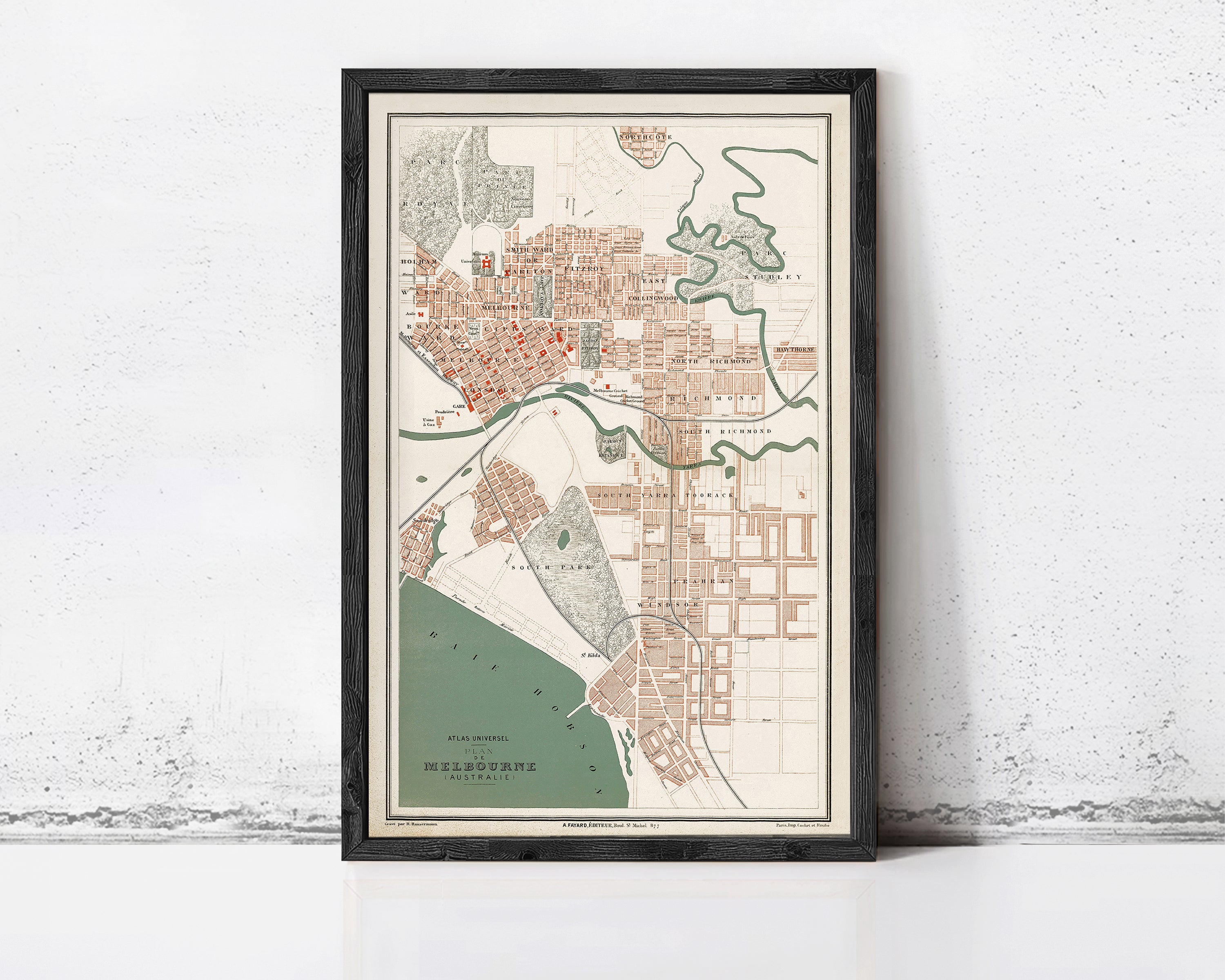 The image is a framed vintage map of Melbourne, Australia, depicting the city's layout and surrounding areas.