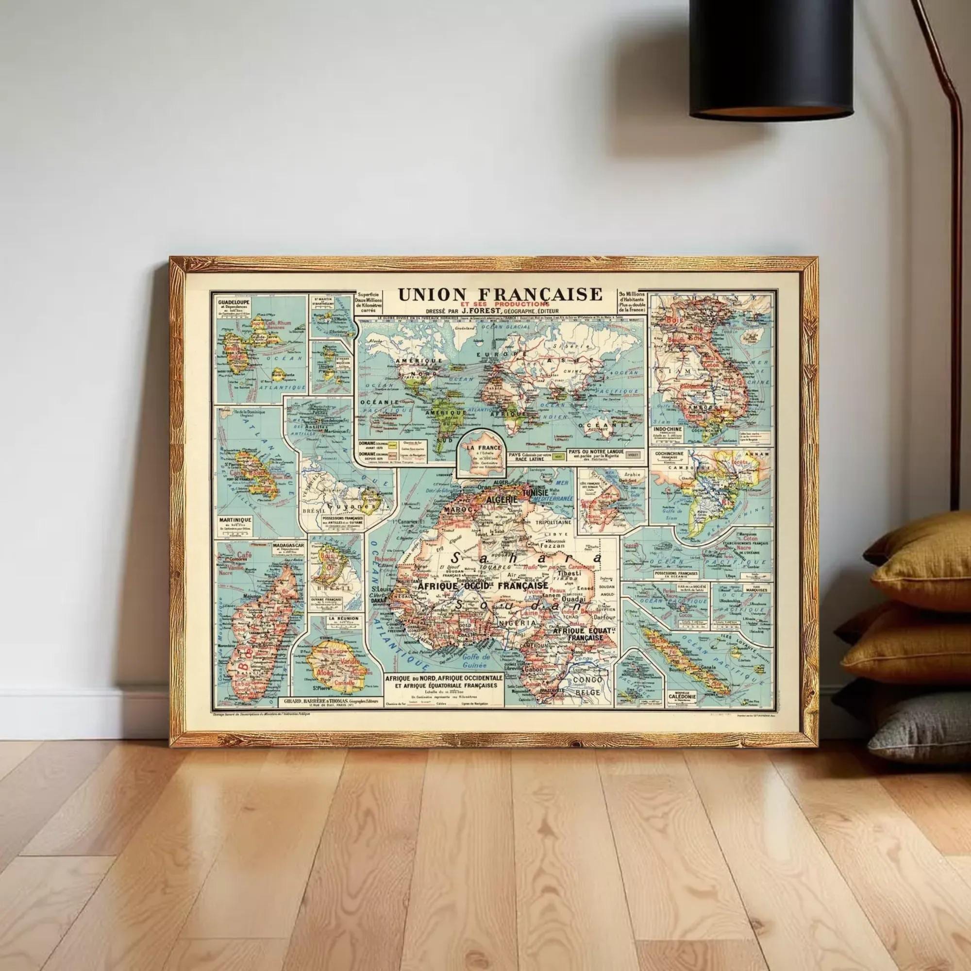 a framed vintage map of France, with various regions and islands depicted in different colors and sizes.