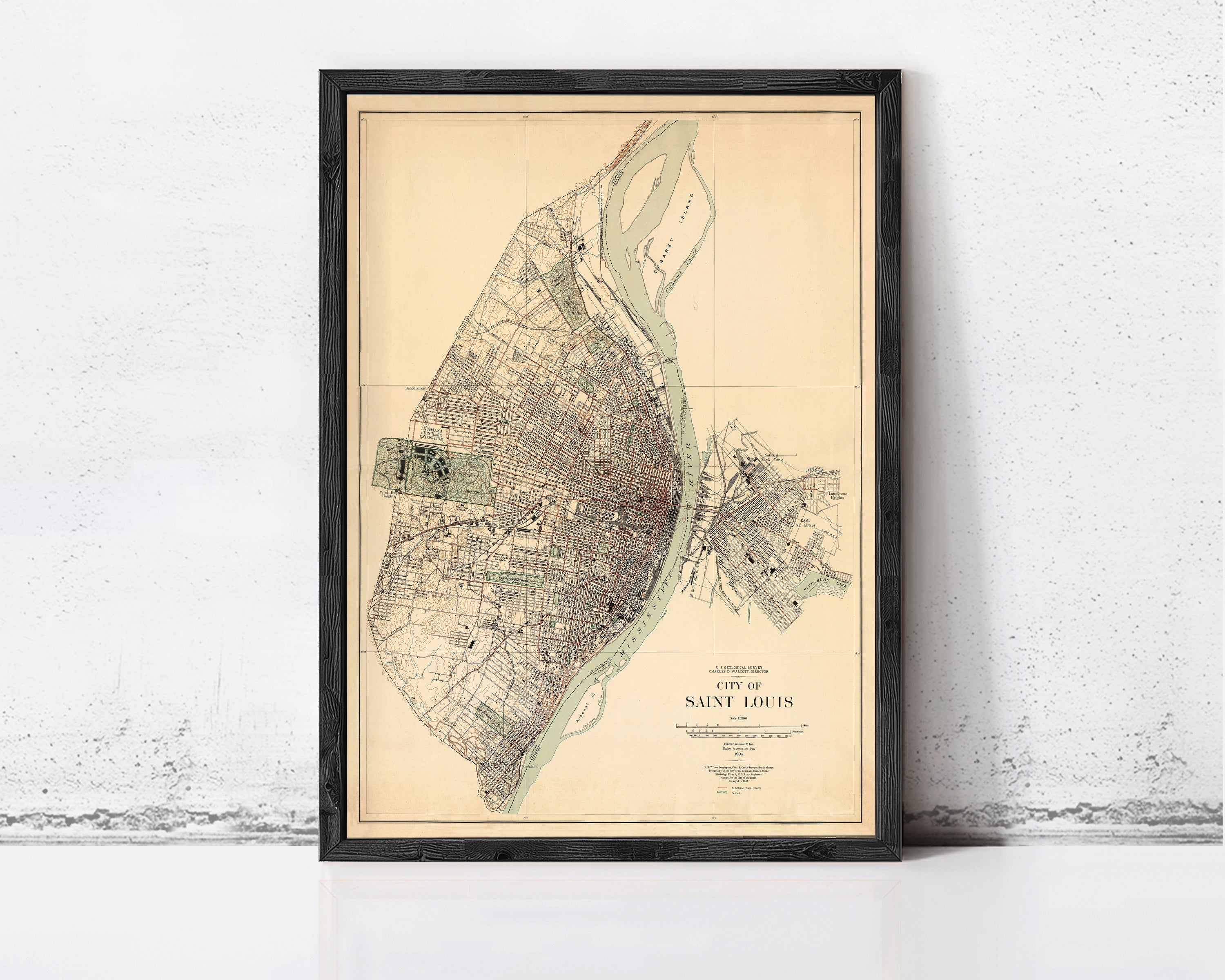 The image is a framed map of Saint Louis, Missouri, depicting the city's layout and surrounding areas.