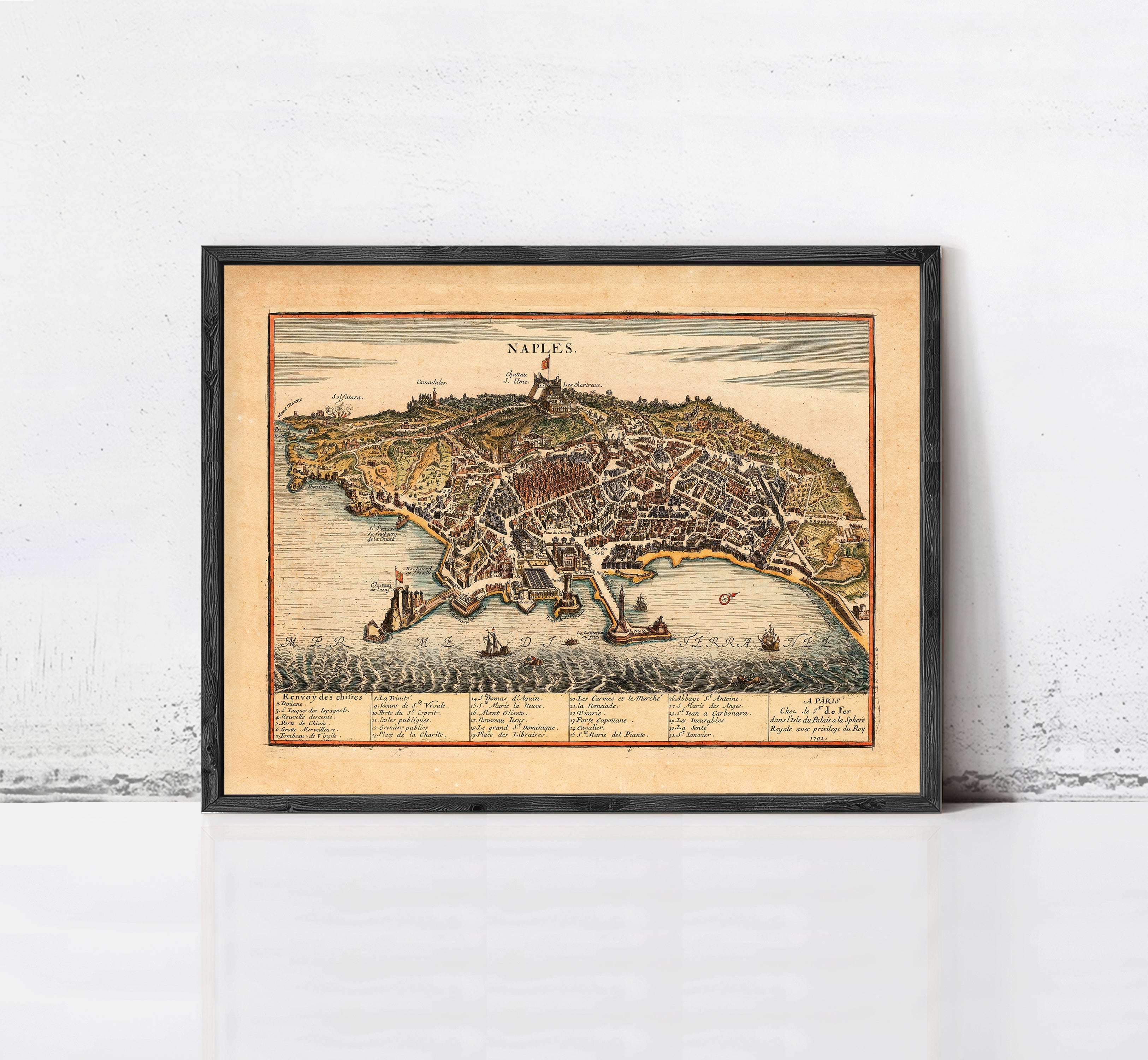 The image is a framed vintage map of Napoli, Italy, depicting the city's layout and surrounding areas.