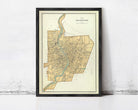 The image is a framed map of the city of Rochester, New York, depicting the city's streets and surrounding areas.