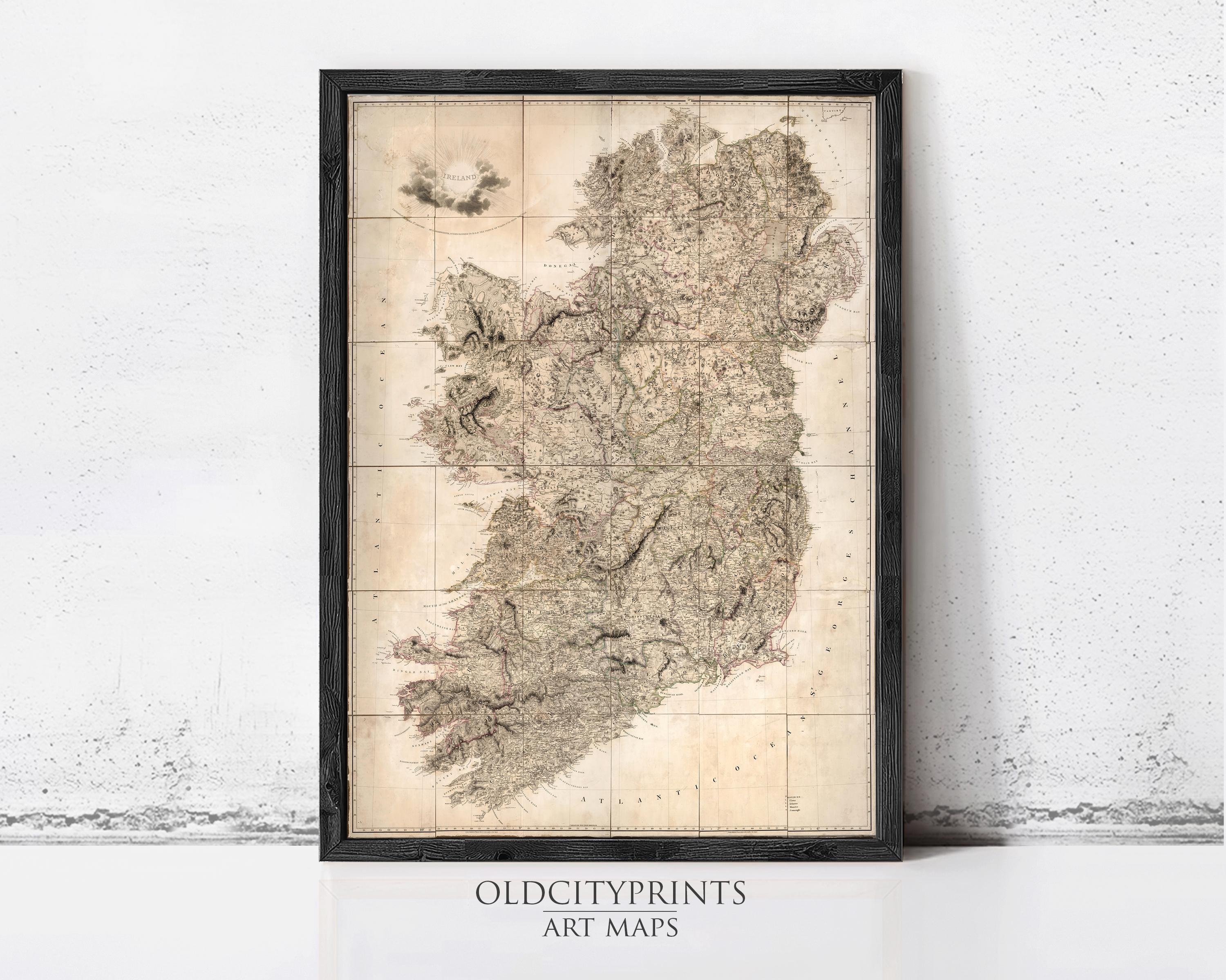 The image is a framed vintage map of Ireland, displayed on a wall.