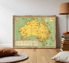 The image is a framed map of Australia, showing various landmarks and locations across the country.