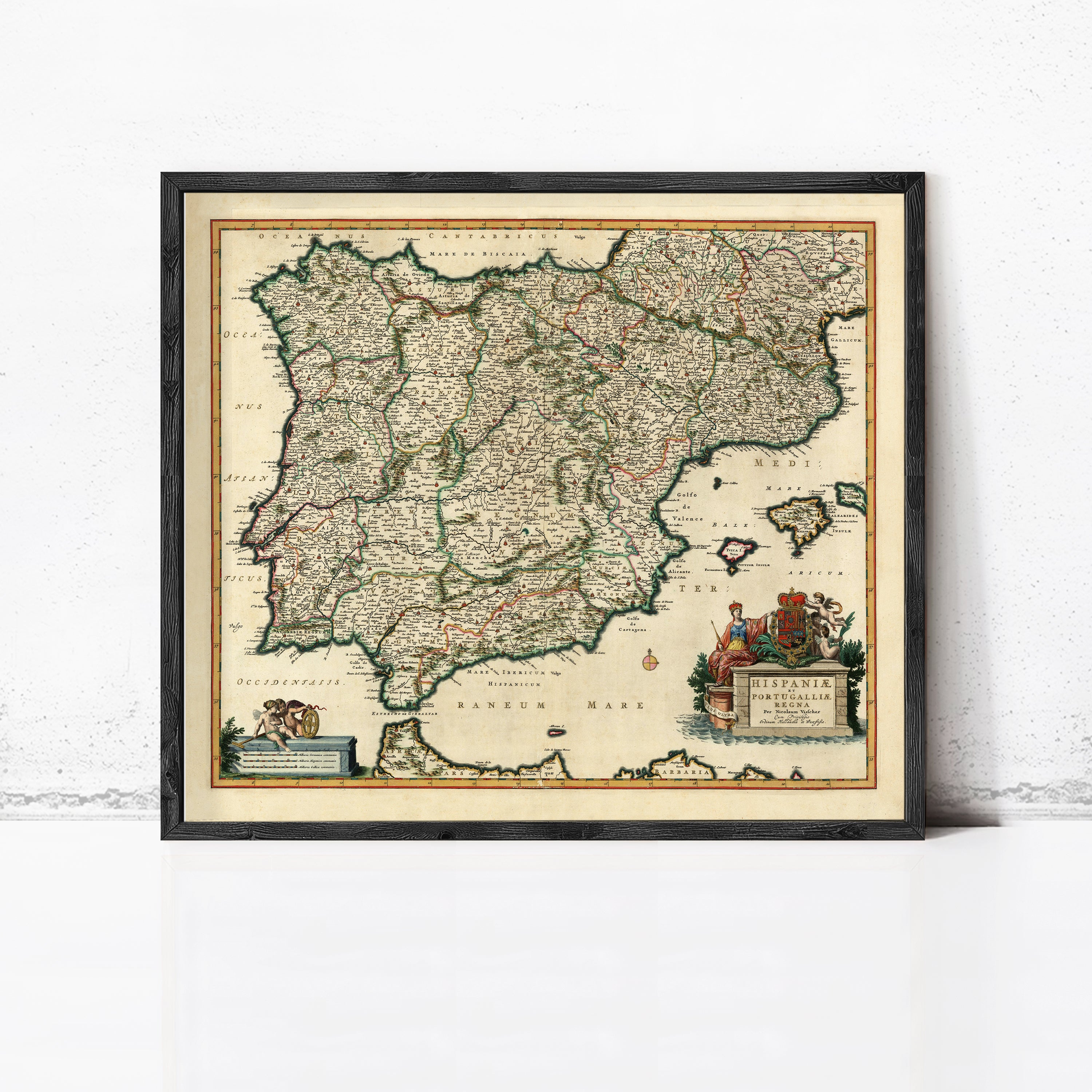 The image is a framed vintage map of the Iberian Peninsula, showing the various regions and islands within the region.