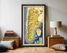 The image is a framed vintage map of South America, featuring various countries and regions with labels and illustrations.