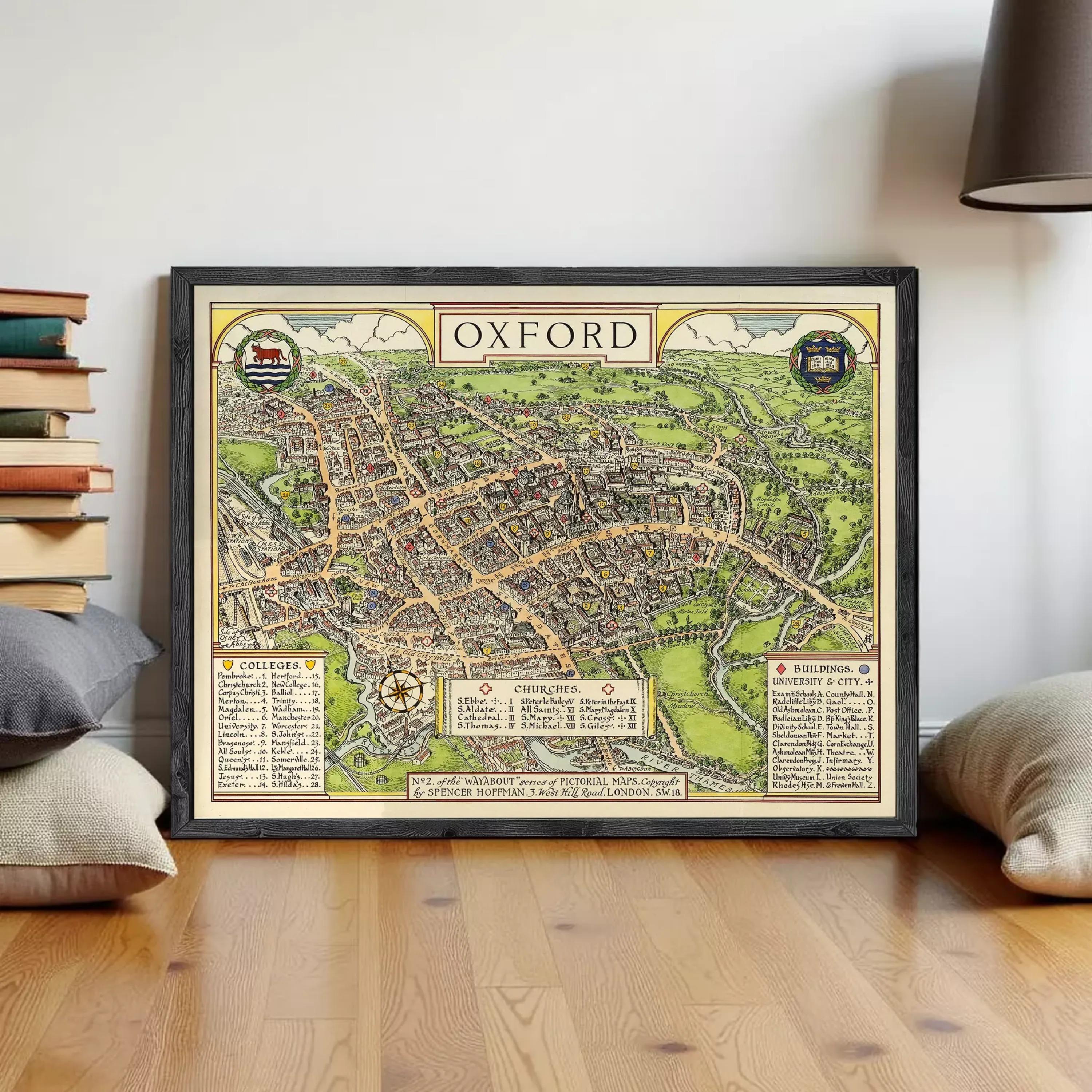 The image is a framed vintage map of Oxford, England, depicting the city's layout and surrounding areas.