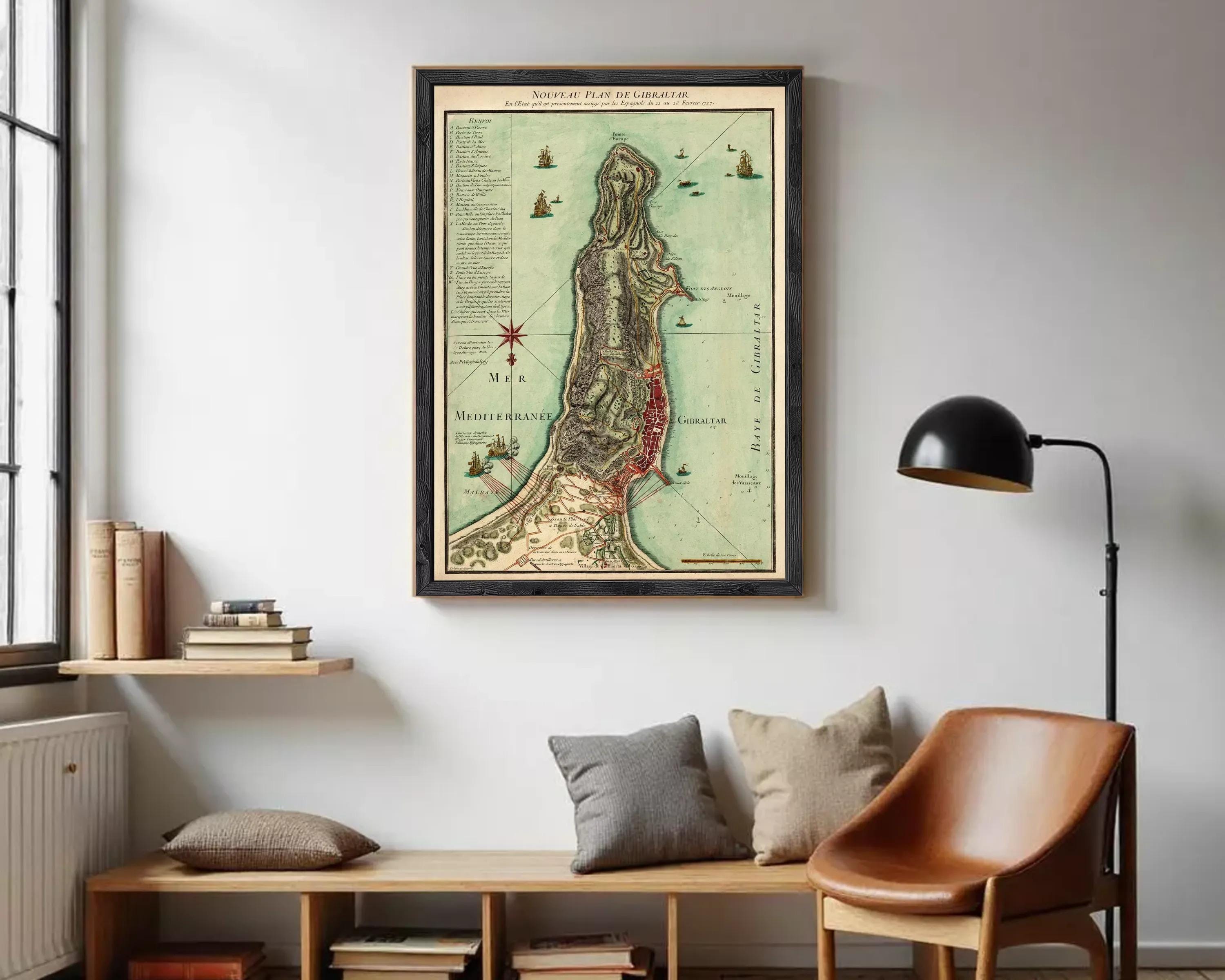 The image is a framed map of the island of Gibraltar, showing the surrounding areas and the coastline.