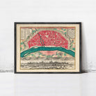 The image is a framed vintage map of a city, depicting a detailed layout of the city's streets, landmarks, and surrounding areas.