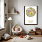 a cozy living room with a large map of Prague hanging on the wall, a lamp, a chair, a stack of books, and a small stuffed animal.