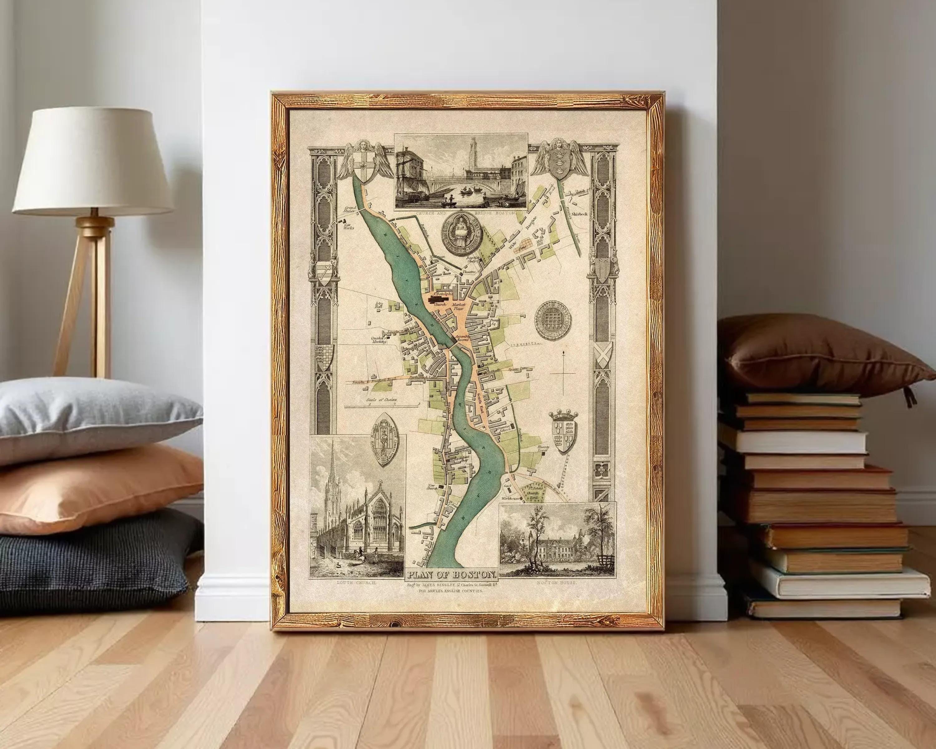 The image is a framed vintage map of a city, depicting various landmarks and streets.