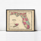 The image is a framed vintage map of Florida, depicting the state in a detailed and colorful manner.