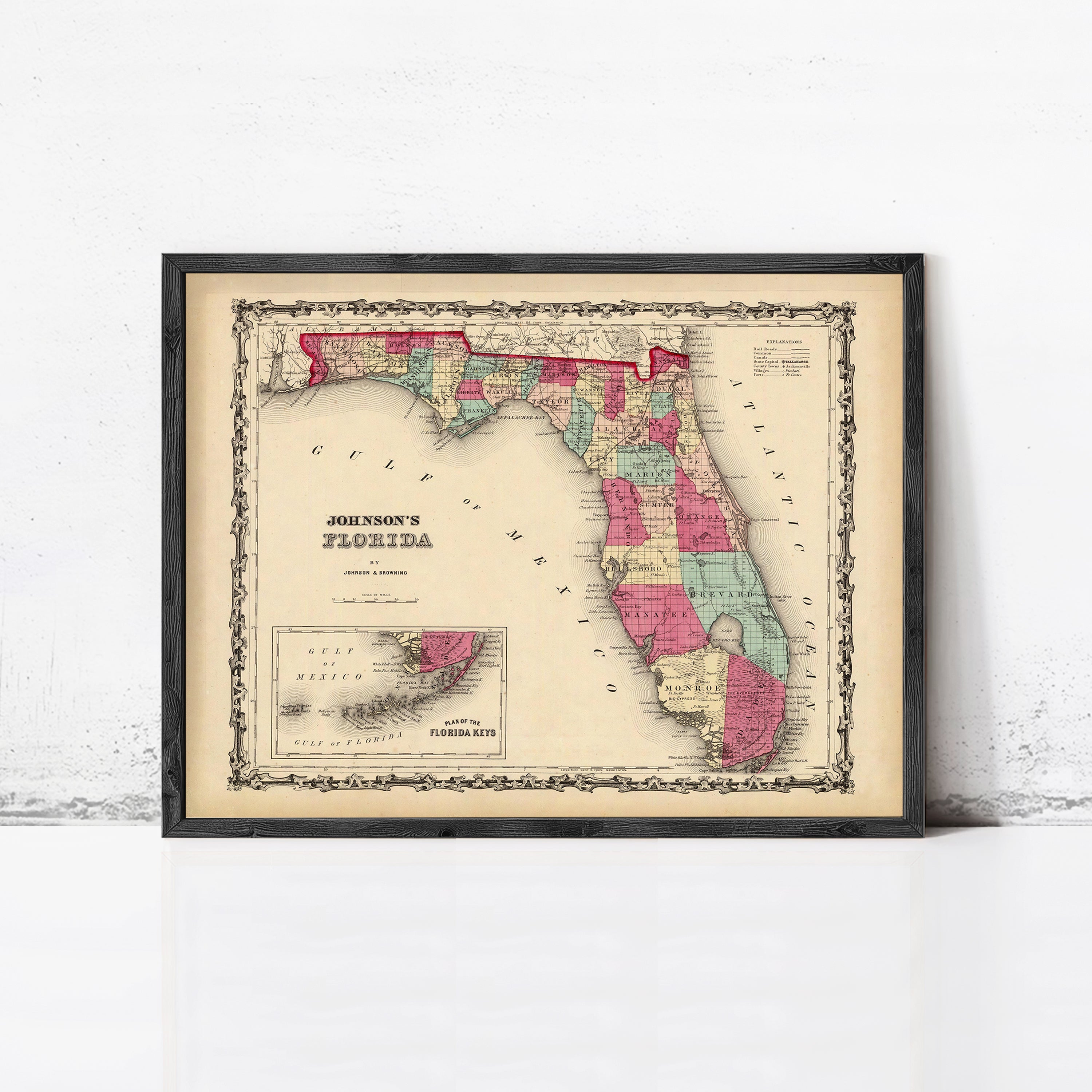 The image is a framed vintage map of Florida, depicting the state in a detailed and colorful manner.