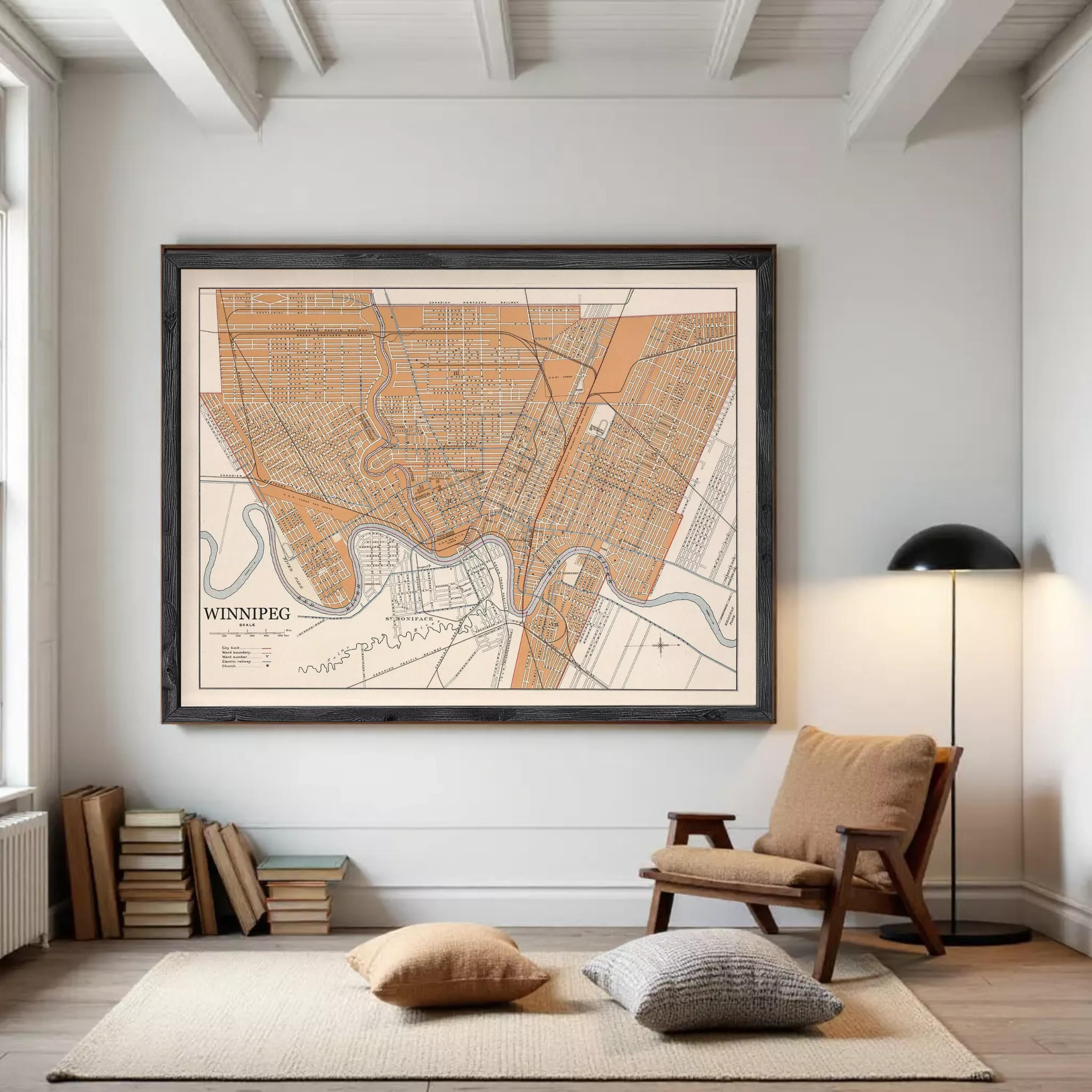 a large framed map of the city of Winnipeg hanging on a wall in a living room.