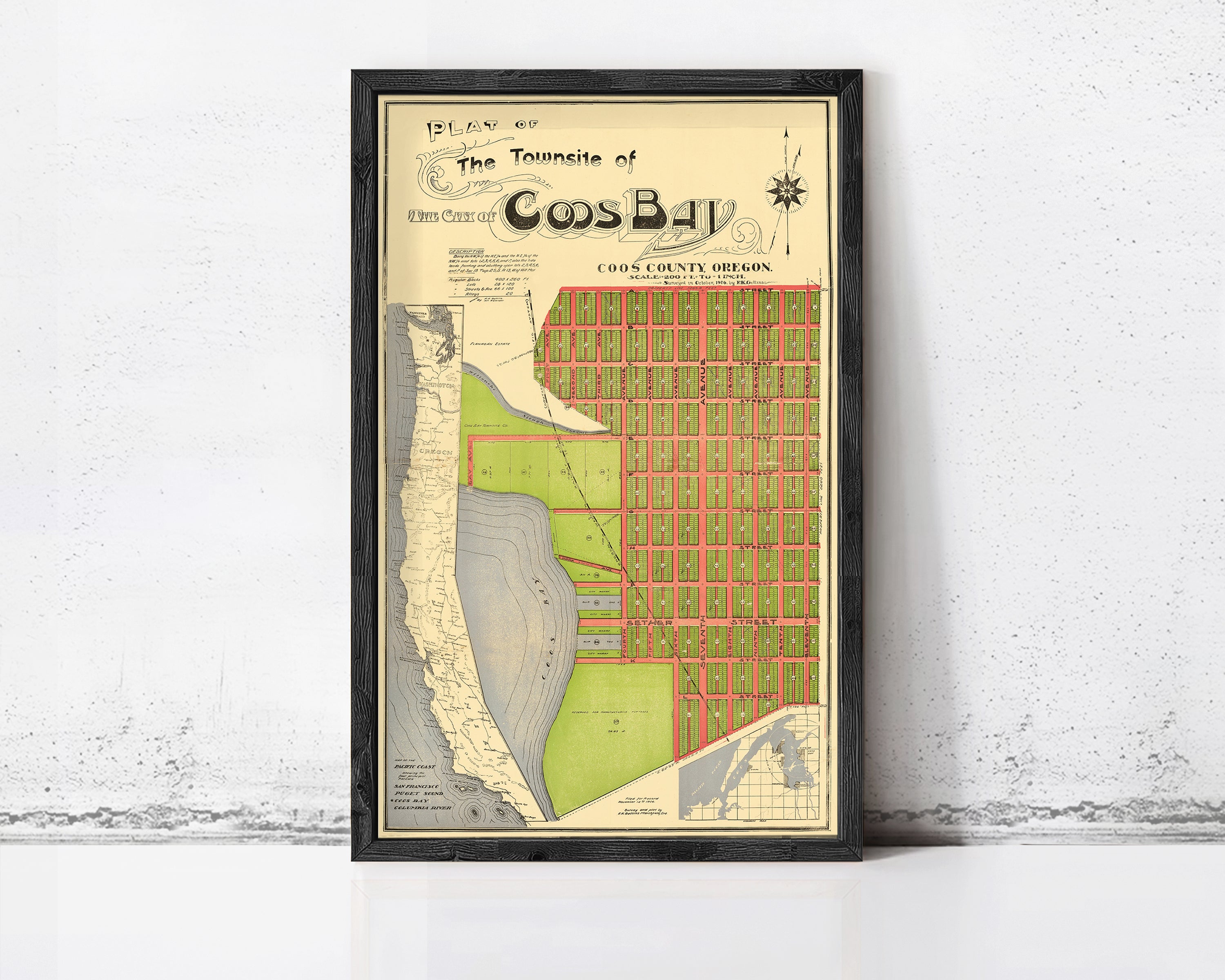 The image is a framed vintage map of the Town of Cos Bay, Oregon, depicting a detailed layout of the area.